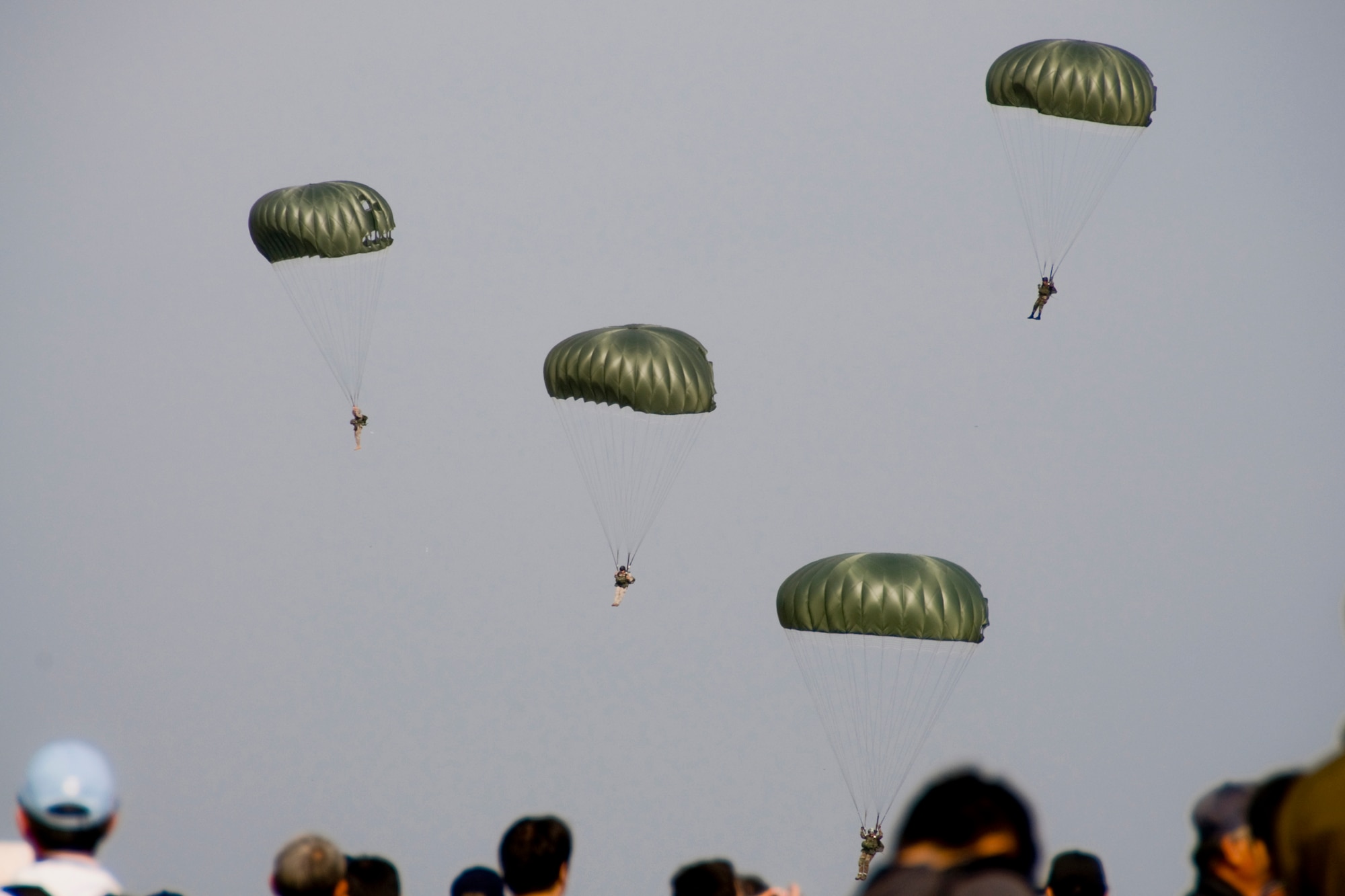 MISAWA AIR BASE, Japan -- Members of Survival, Evasion, Resistance and Escape teams perform a parachute demonstration during the Misawa Air Fest 2009 Oct. 18. (U.S. Air Force photo/Senior Airman Jamal D. Sutter)