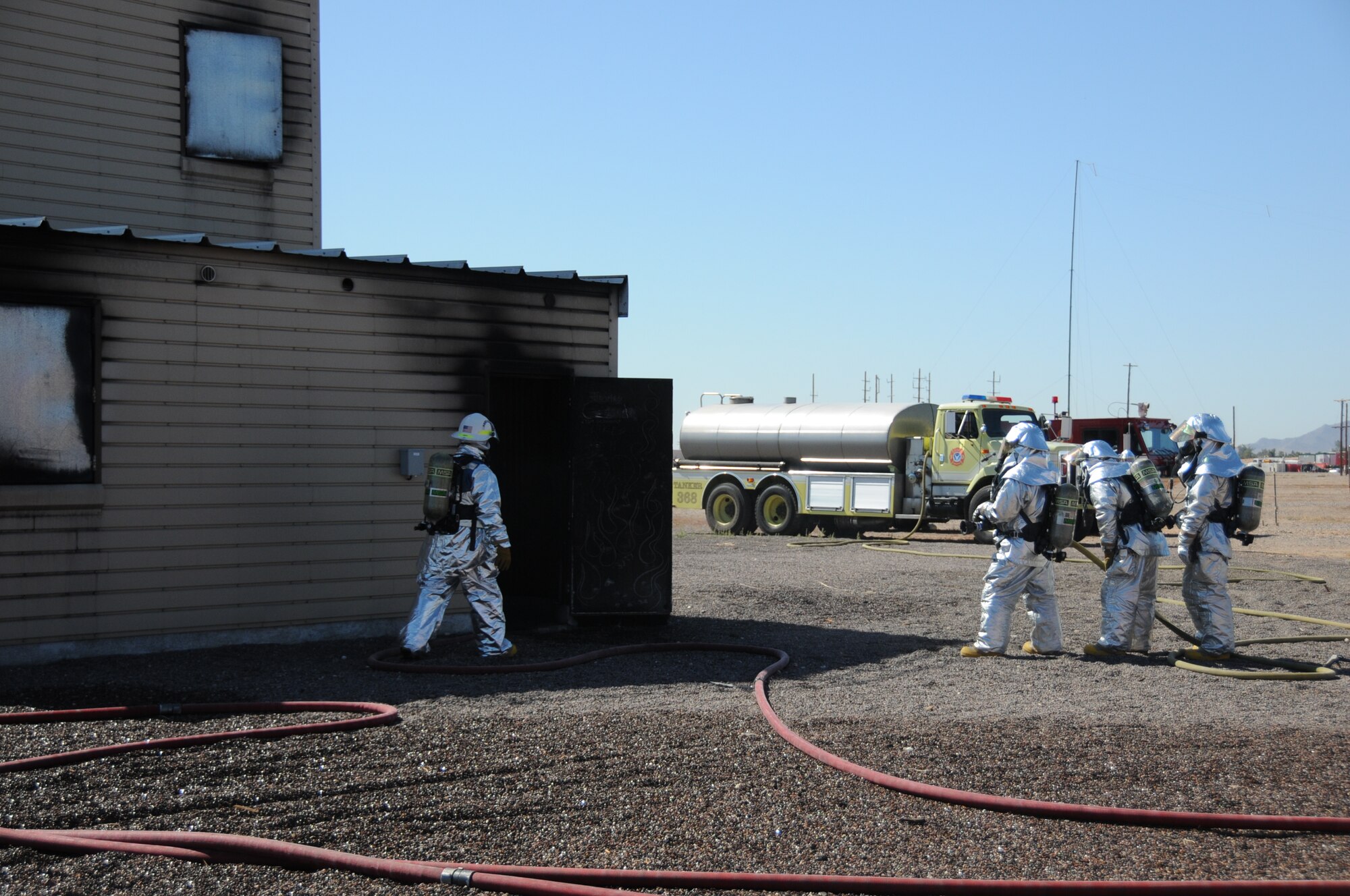 Firefighters from the 944th Civil Engineer Squadron conduct a structural fire exercise Oct. 17 as part of their annual training requirements. (U.S. Air Force photo/Tech. Sgt. Susan Stout)