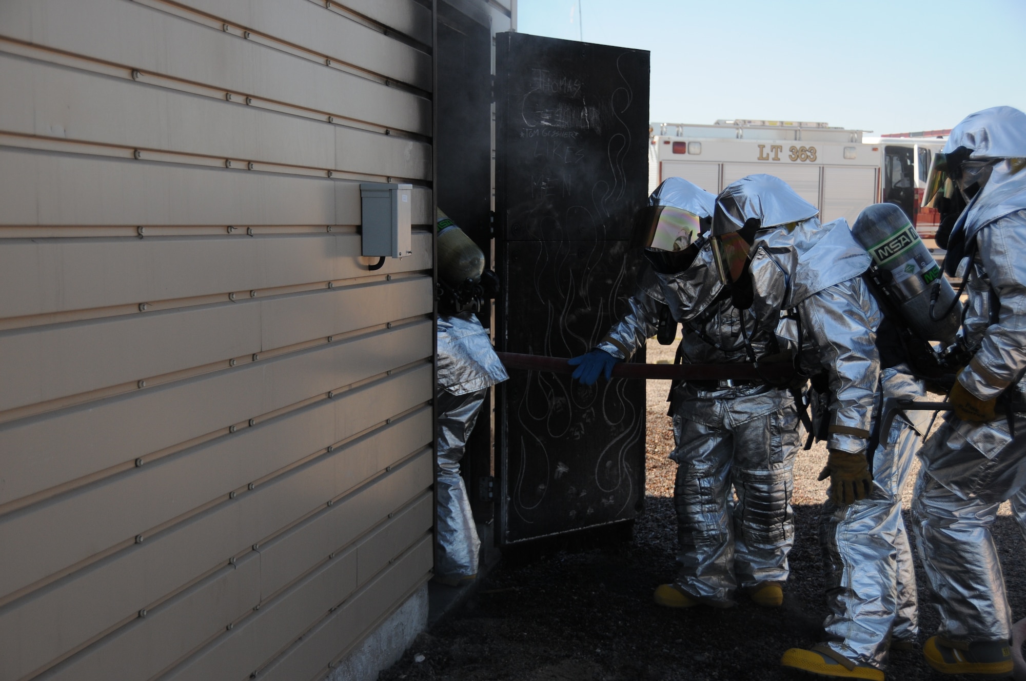 Firefighters from the 944th Civil Engineer Squadron conduct a structural fire exercise Oct. 17 as part of their annual training requirements. (U.S. Air Force photo/Tech. Sgt. Susan Stout)
