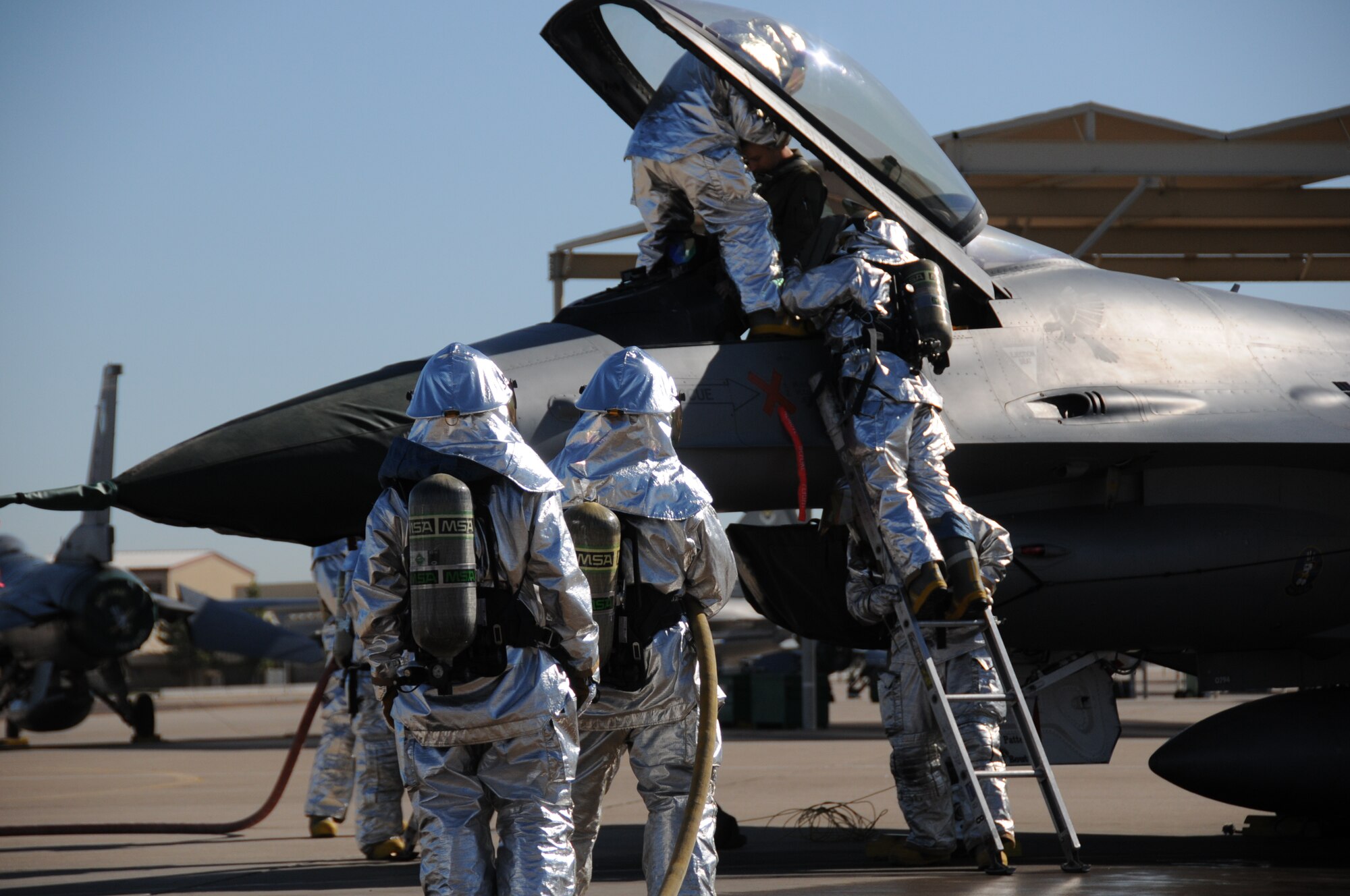 Firefighters from the 944th Civil Engineer Squadron conduct an egress exercise Oct. 17 as part of their annual training requirements. (U.S. Air Force photo/Tech. Sgt. Susan Stout)