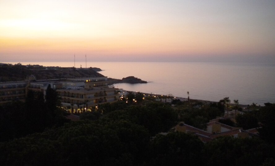 A sunset overlooks Acapulco Hotel Saturday, Oct. 10, 2009, illuminating the seascape surrounding the island of Cyprus. The beaches in Cyprus are popular for their clean, soft sand and clear ocean water. (U.S. Air Force photo/Airman 1st Class Amber Ashcraft)