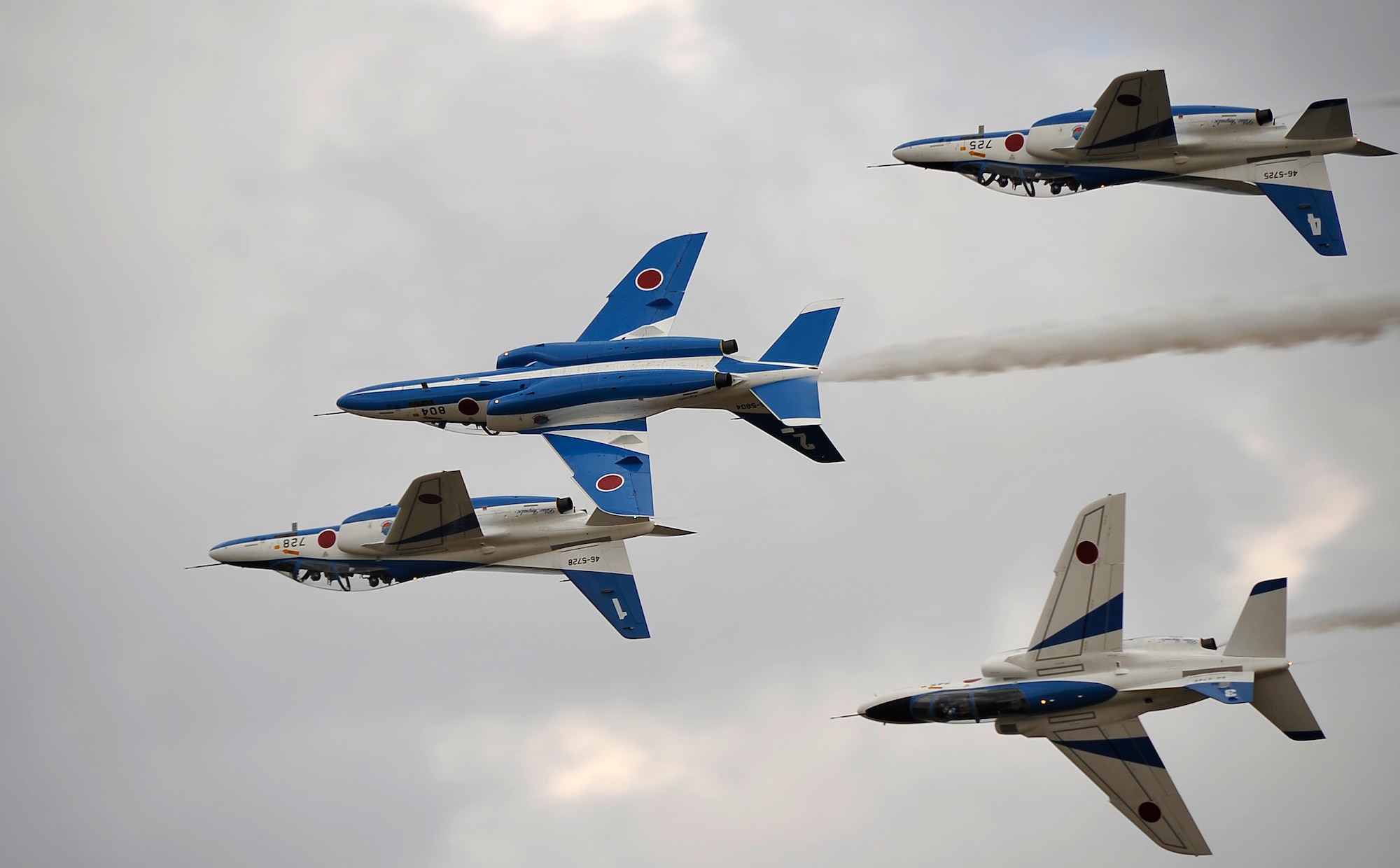 MISAWA AIR BASE, Japan --  The Japan Air Self-Defense Force Blue Impulse, fly in formation as they take part in Air Fest 2009 at Misawa Air Base Oct. 18. The team flies the Kawasaki T-4 and are based at Matsushima Air Base. (U.S. Air Force photo/Staff Sgt. Chad C. Strohmeyer).