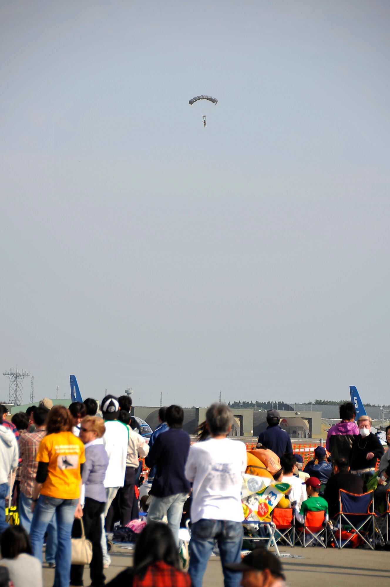 MISAWA AIR BASE, Japan --  A survival, evasion, resistance and escape instructor, parachutes down to the ground during Air Fest 2009 at Misawa Air Base Oct. 18. An estimated 250,000 people attended the show. (U.S. Air Force photo/Staff Sgt. Chad C. Strohmeyer).