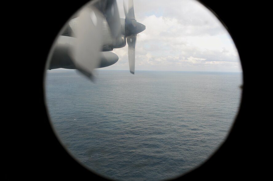 MOODY AIR FORCE BASE, Ga. -- An HC-130P Combat King flies over the Atlantic Ocean during a personnel recovery mission in search for a downed F-16 Fighting Falcon pilot from Shaw Air Force Base, S.C., Oct. 17. The HC-130P provides aerial refueling for the HH-60Gs, enabling rescue efforts to be extended.(U.S. Air Force photo by Airman 1st Class Joshua Green)
