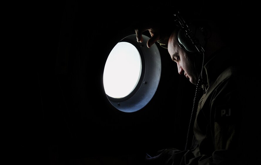 MOODY AIR FORCE BASE, Ga. -- After spending numerous hours scanning the Atlantic Ocean for an F-16 pilot, Senior Airman Louis Hause, 38th Rescue Squadron pararescueman, takes a quick break Oct. 17. During the rescue mission, crews implemented rotation schedules to help combat mental and physical exhaustion. (U.S. Air Force photo by Airman 1st Class Joshua Green)
