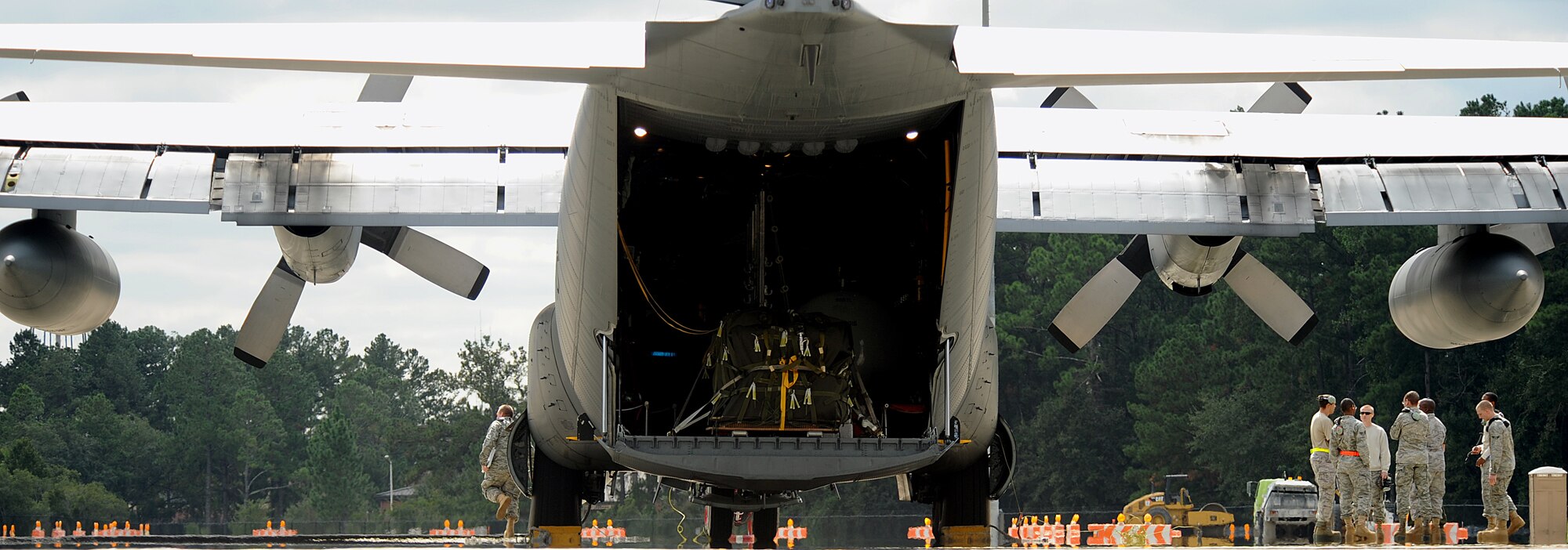 MOODY AIR FORCE BASE, Ga. -- Airmen from the 723rd Aircraft Maintenance Squadron finish preparing a HC-130P Combat King for flight in support of a search and rescue mission over the Atlantic Ocean here Oct. 17. Airmen from Moody’s 347th Rescue Group assisted in joint efforts to recover the F-16 Fighting Falcon pilot from Shaw Air Force Base, S.C., who went missing following a mid-air collision with another aircraft. (U.S. Air Force photo by Airman 1st Class Joshua Green)