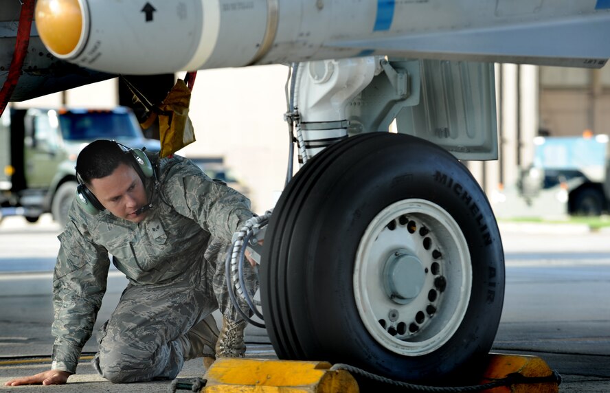 MOODY AIR FORCE BASE, Ga. -- Senior Airman Brian Moran, 75th Aircraft Maintenance Unit A-10C Thunderbolt II assistant dedicated crew chief, prepares an A-10 for launch to Red Flag at Nellis Air Force Base, Nev., here Oct. 17. The 23rd Fighter Group participates in Red Flag, a multinational exercise, to practice aerial combat scenarios in a realistic environment. (U.S. Air Force photo by Staff Sgt. Elizabeth Rissmiller)