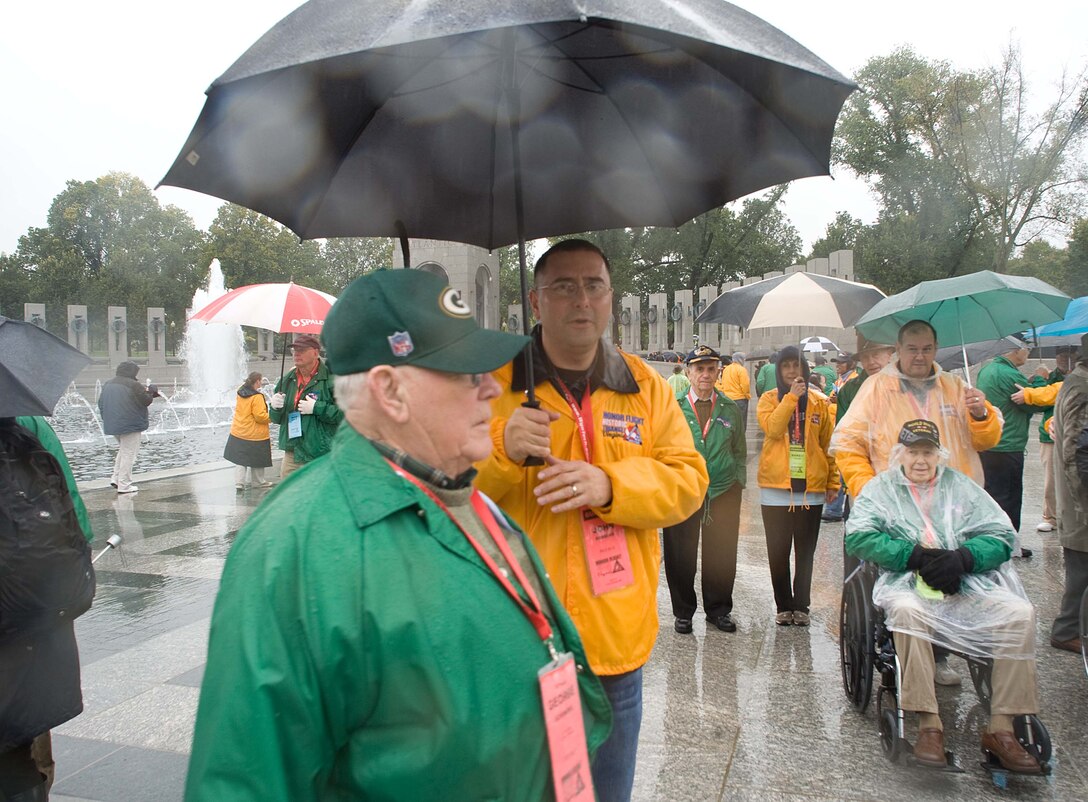 LANGLEY AIR FORCE BASE, Va. – World War II veterans and volunteers, tour the National World War II Memorial in Washington, D.C., Oct. 17.  Twice a year, the Honor Flight Historic Triangle Virginia, and Langley volunteers, chauffeur veterans to the WW II memorial in Washington, D.C.  (U.S. Air Force photo/Staff Sgt. Barry Loo)