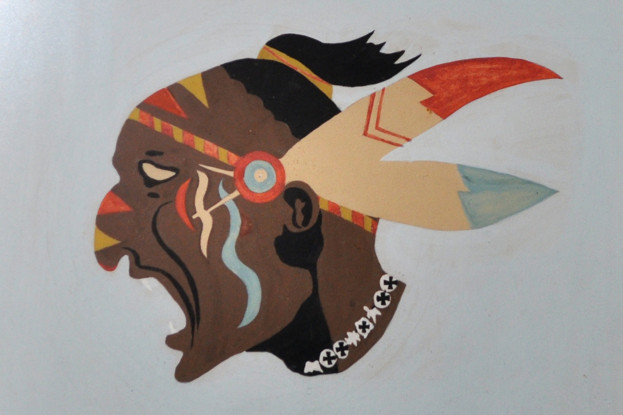 Original “Indian Head” design for the 93rd Bomb Squadron. It was conceived by 1st Lt. Charles R. D’Olive in France during WWI. Lieutenant D’Olive went on to shoot down five German aircraft during the war and received the Distinguished Service Cross for downing three German aircraft in one day on September 13, 1918. (U.S. Air Force photo/Tech. Sgt. Jeff Walston) 