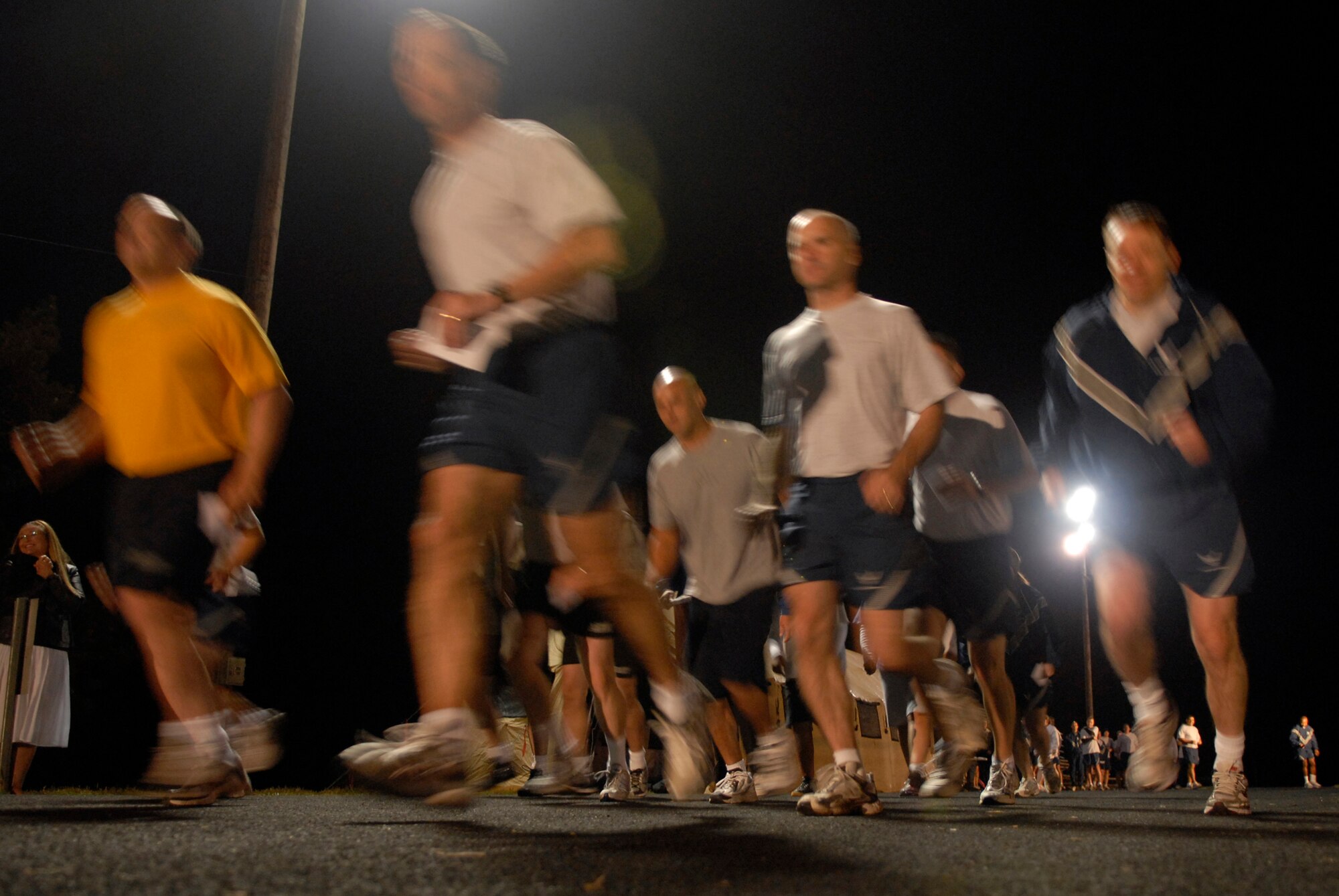 VANDENBERG AIR FORCE BASE, Calif. -- Lt. General Larry James, the 14th Air Force commander, leads military members in the kick off run for “A Run to Remember” here Monday, Oct. 19, 2009. The 2nd Annual Run to Remember provides military members, Department of Defense civilians, contractors and retirees the opportunity to run a mile for servicesmembers who died in support of Operations Enduring and Iraqi Freedom. (U.S. Air Force photo/Senior Airman Andrew Satran)
