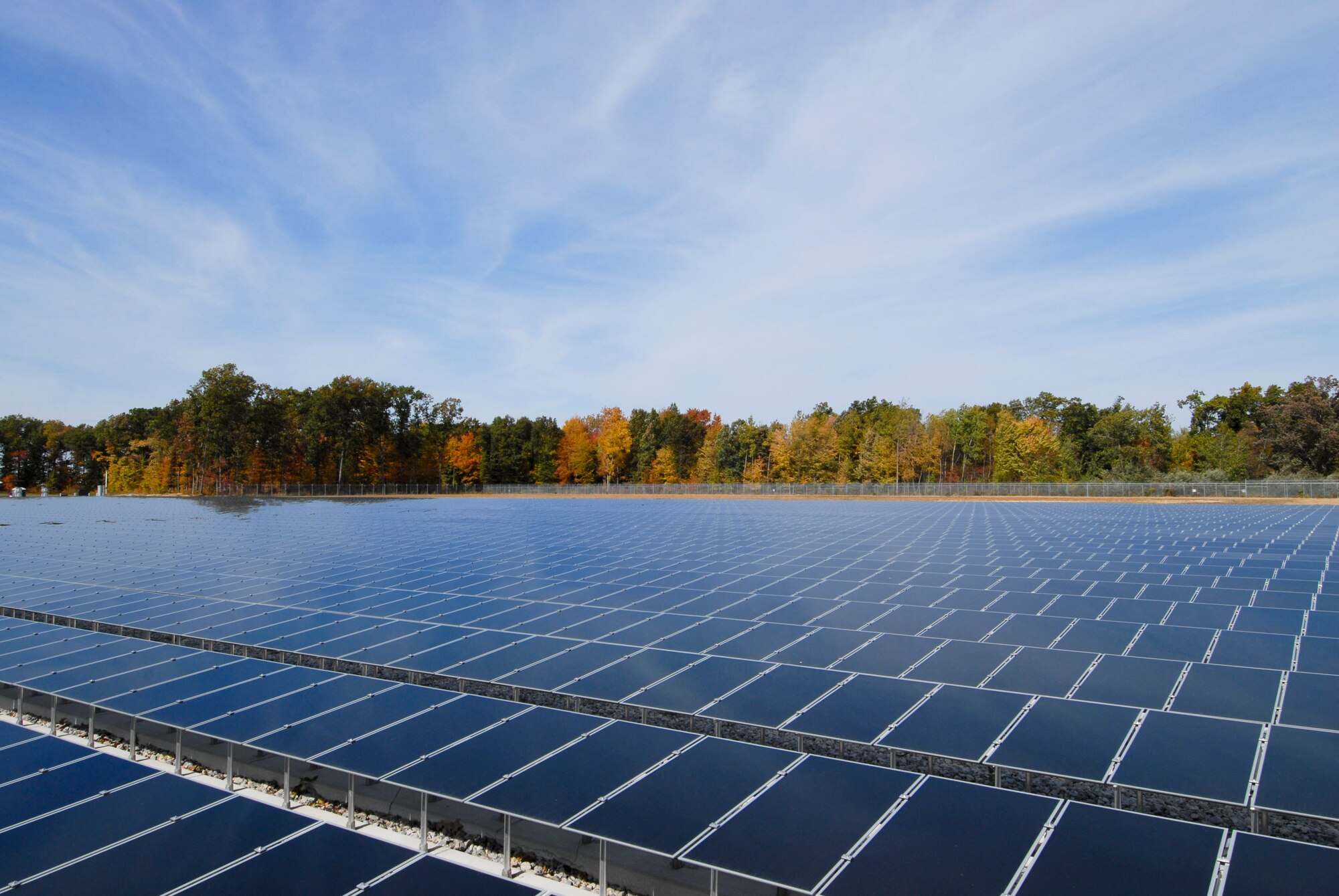 A photograph of the new 180th Fight Wing (FW), Ohio Air National Guard, solar field located in Swanton, Ohio, taken Oct 19, 2009. The solar field, set for completion October 2010, is part of the 180th FWs Renewable Energy Project funded by the Department of Defense Research and Development Program in an effort to reduce the use of limited fossil fuel sources and dependence on foreign energy sources. (USAF Photo by MSgt Beth Holliker)