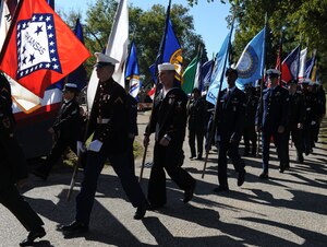 LANGLEY AIR FORCE BASE, Va. -- Fifty local military members from all branches march with state flags during the 2009 Yorktown Day parade in Yorktown, Va., Oct. 19. Military members represented each state while commemorating the Battle of Yorktown, which brought an end to the American Revolutionary War. (U.S. Air Force photo/Senior Airman Zachary Wolf) 