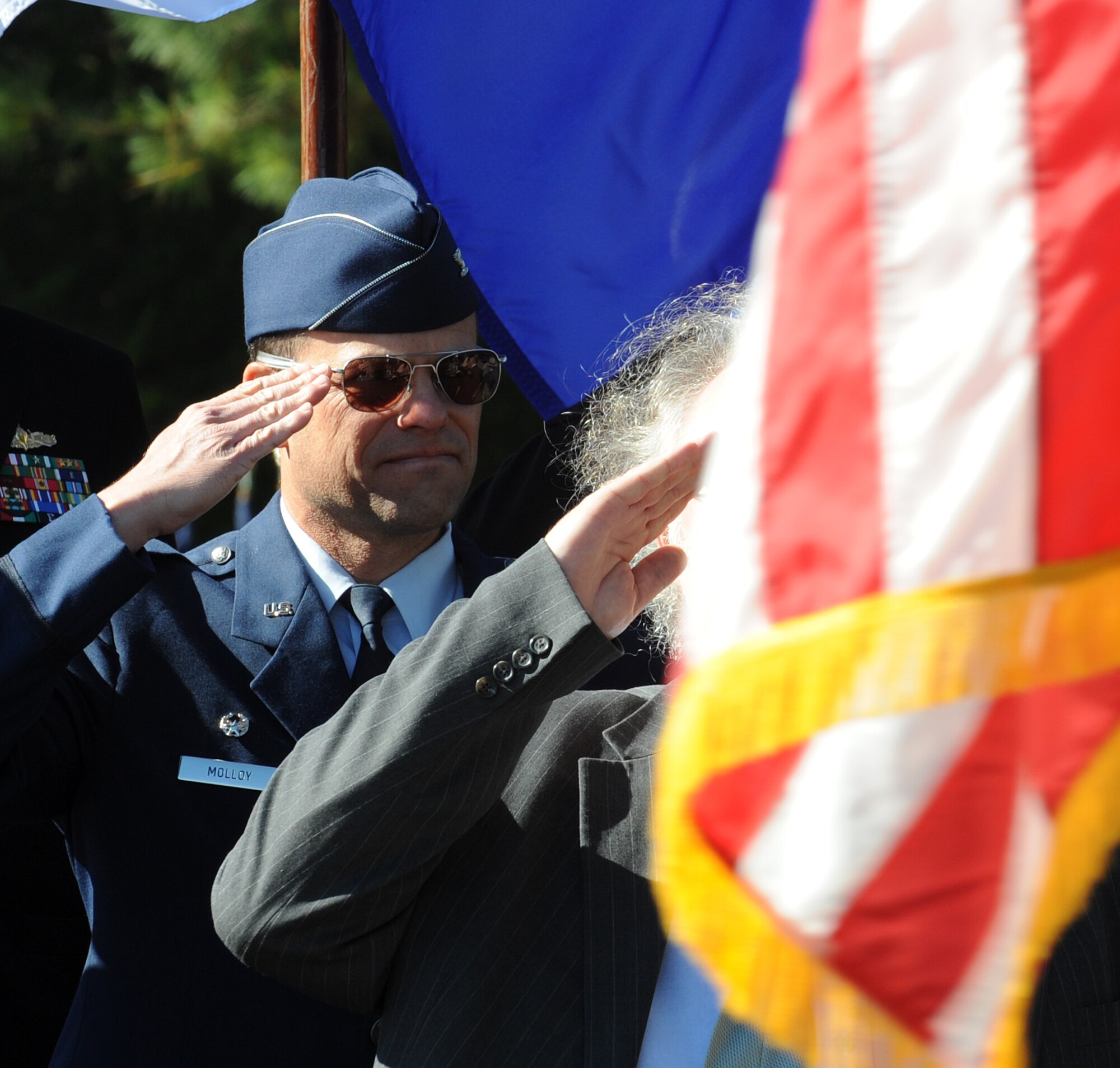 LANGLEY AIR FORCE BASE, Va. --  Col. Matt Molloy, 1st Fighter Wing commander, salutes the flag during the 2009 Yorktown Day parade in Yorktown, Va., Oct. 19. Langley Airmen marched with members of the local community during the parade commemorating the Battle of Yorktown, which brought an end to the American Revolutionary War.  (U.S. Air Force photo/Senior Airman Zachary Wolf)
