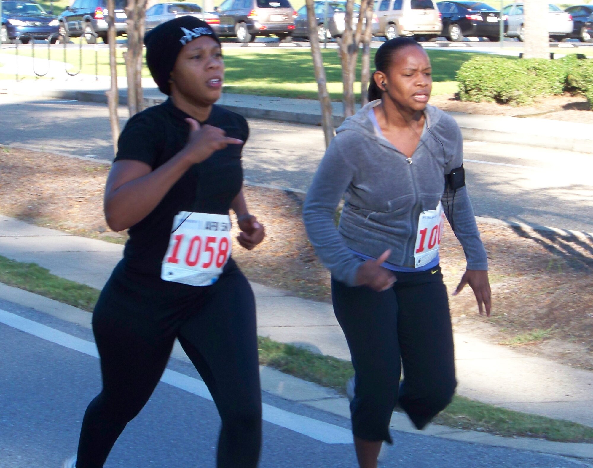 Pascha Avery, left, and Senior Airman Melodee Jackson, 1st Special Operations Medical Support Squadron, run at the 5k Commando Run at the Aderholt Fitness Center at Hurlburt Field Oct. 17. (Air Force photo by Airman 1st Class Joe McFadden.)