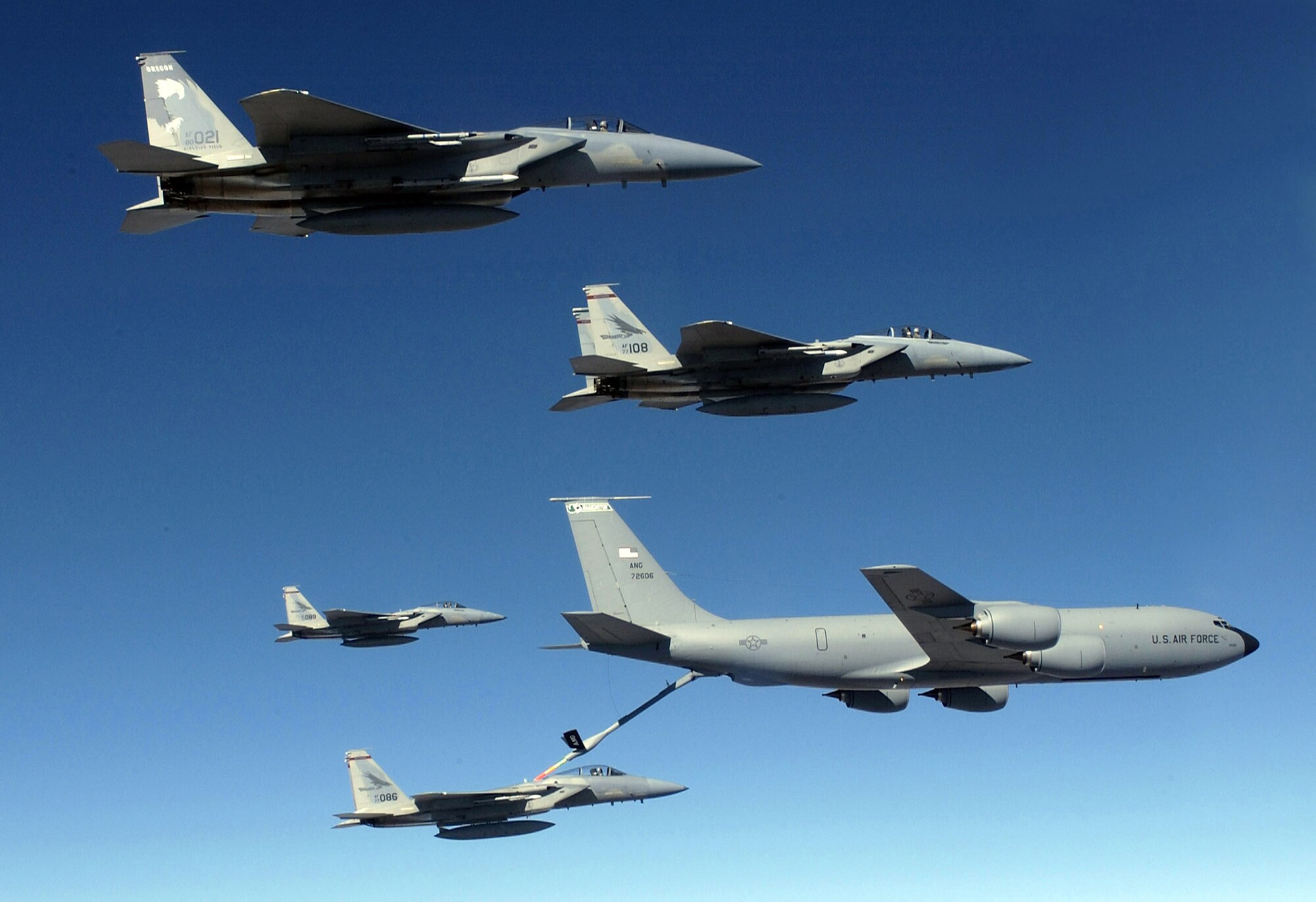 A KC-135 Stratotanker aircrew refuels four F-15 Eagles over Afghanistan. In 2008, Air Force tankers passed more than 1 billion gallons of gas to coalition aircraft. (U.S. Air Force photo/Staff Sgt. James L. Harper Jr.)