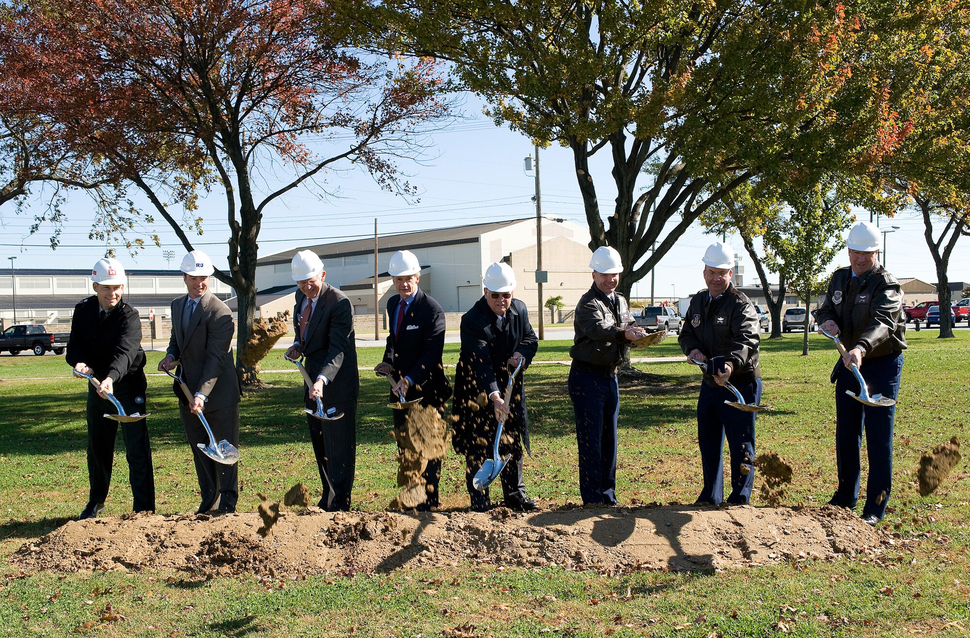 From left, Lt. Col. Thomas Tickner, U.S. Army Corps of Engineers Philadelphia District commander, Dean Johnson, Richard Y. Johnson and Son, Inc., program manager, Rep. Mike Castle, Sen. Tom Carper, Carleton Carey, City of Dover mayor, Col. Manson Morris, 436th Airlift Wing commander, Col. Michael Fitzhenry, 512th AW commander, and Col. Todd Emmert, 436th Mission Support Group commander, break ground for a new fitness center at Dover Air Force Base Oct. 19.  (U.S Air Force photo by Jason Minto)