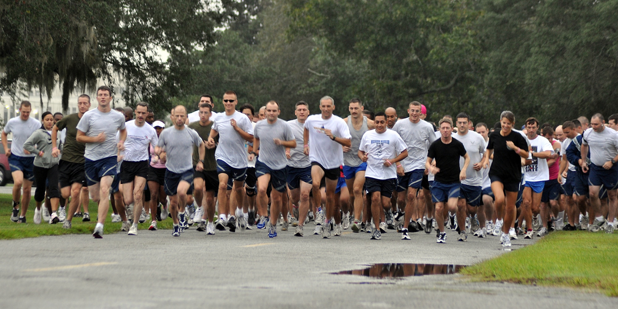EGLIN AIR FORCE BASE, Fla. --  More than 300 people participated in the Breast Cancer Awareness Month 5K Run, Oct. 16. The event was held to raise awareness of the importance for women to self-test and catch the disease in its early stages. Capt. Scott Griffith, Operational Flight Program Combined Test Force, and Paula Piazza, 96th Medical Operations Squadron, were the first male and female to finish the run with a time of 15:58 and 18:54, respectively. (U.S. Air Force photo/ Airman Anthony Jennings)