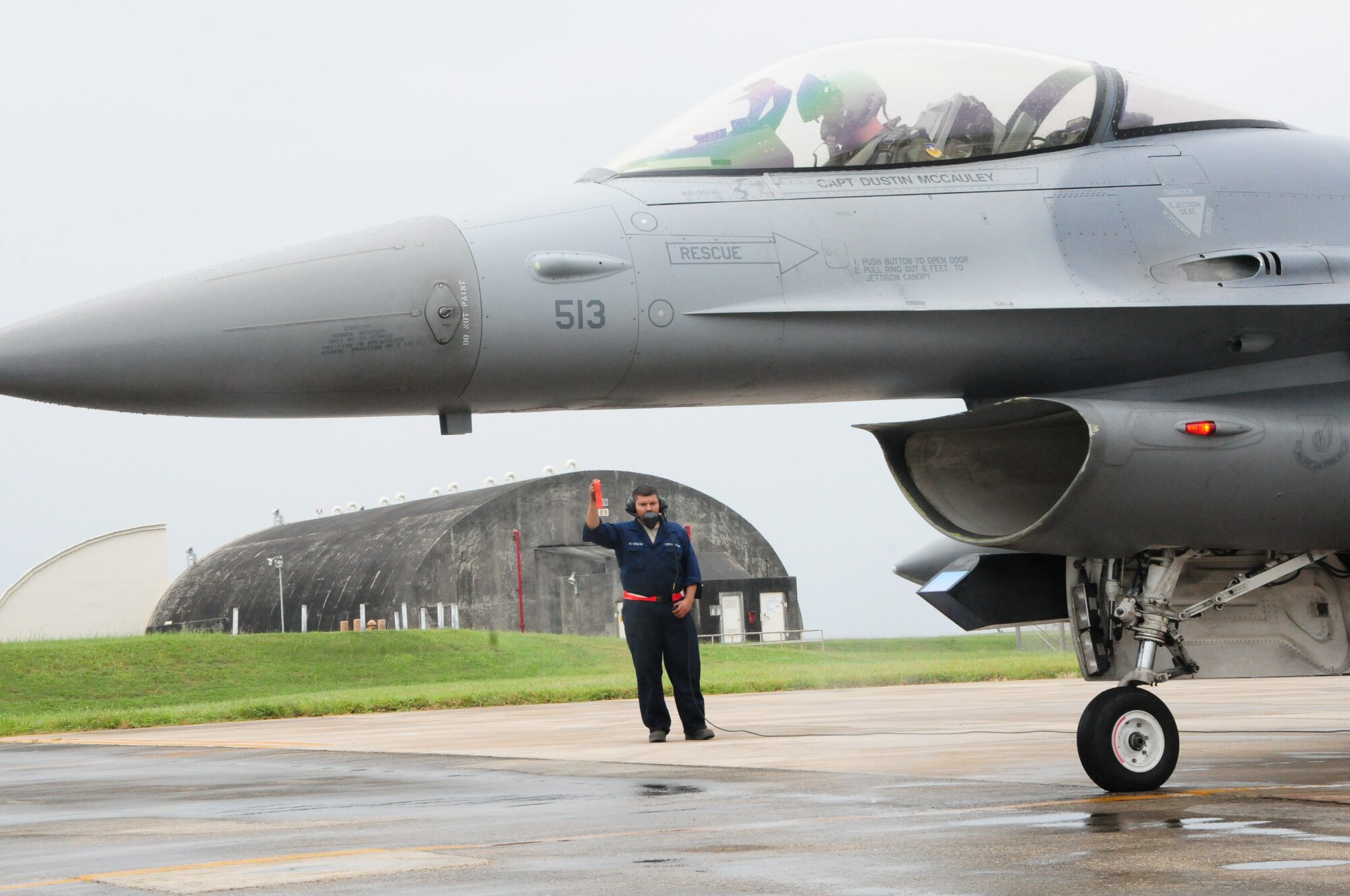 Senior Amn Luis McGraw, a crew chief with the 36th Aircraft Maintenance Unit/51st Aircraft Maintenance Squadron conducts a pre-flight inspection on an F-16 Viper from Osan Air Base during the Ryukyu Air Warrior training affair here at Kadena Air Base, 15 October, 2009. The RAW is a weeklong training event that brought together aircraft from not only other PACAF bases, but other services as well. 
(U.S. Air Force photo/Staff Sgt. Lakisha A. Croley)

