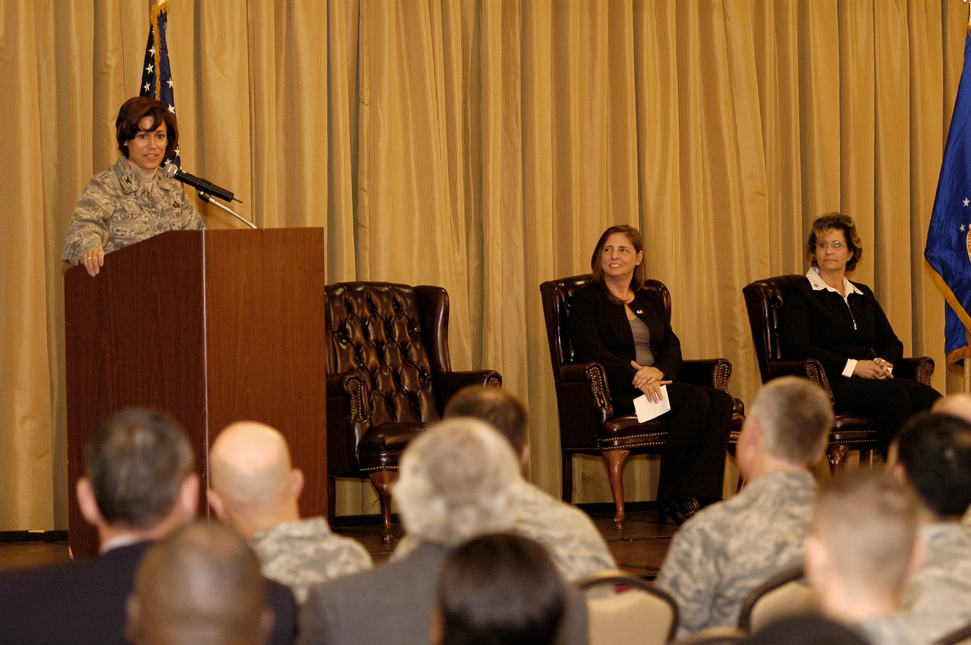 Col. Gina Grosso, Joint Base McGuire-Dix-Lakehurst commander, addresses attendees at the 2009 Combined Federal Campaign kick-off ceremony here Oct. 15. Seated to the right are Valerie Scott and Mary Jane Flammer, both CFC representatives from two of the organizations available for donations. This year's campaign is JB MDL's first fundraising initiative. (U.S. Air Force photo/Carlos Cintron)
