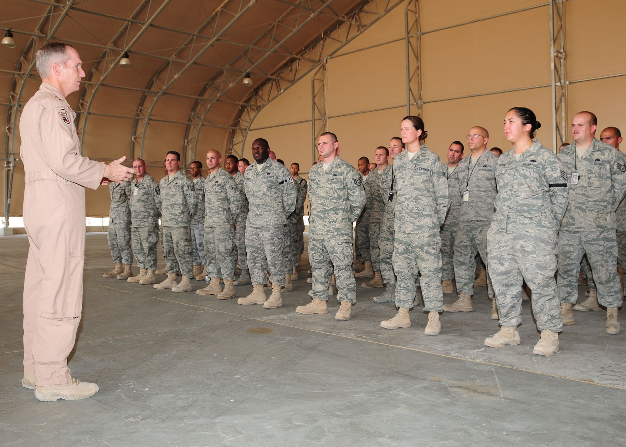 SOUTHWEST ASIA -- Lt. Gen. Mike Hostage, Commander, U.S. Air Forces Central Command, briefs 386th Expeditionary Maintenance Group members during a visit to the 386th Air Expeditionary Wing at an undisclosed location in Southwest Asia Oct. 18, 2009.  (U.S. Air Force photo/Tech. Sgt. Tony Tolley)