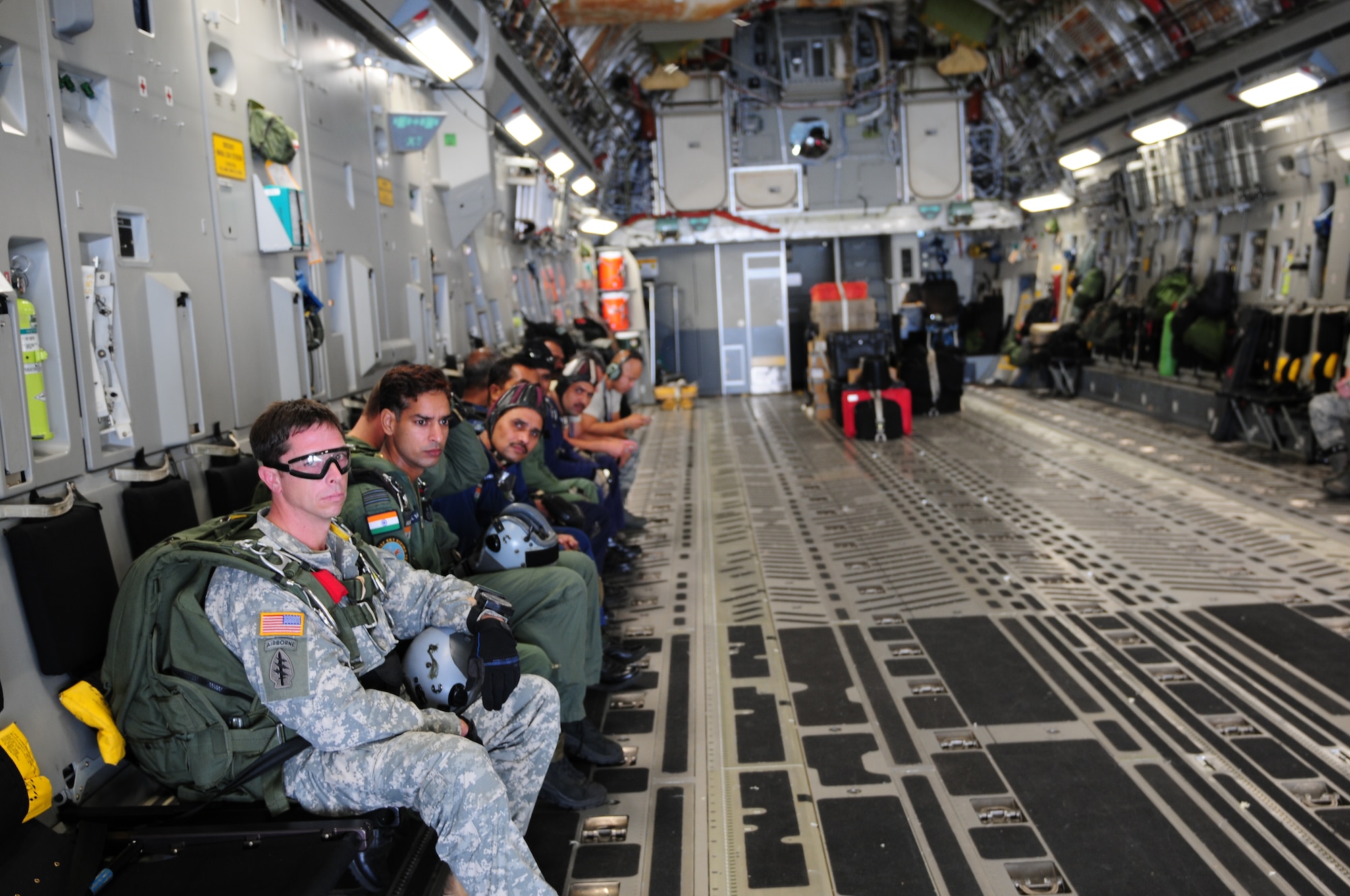 Special Operations Forces from the United States and India prepare to jump out of C-17 Globemaster III, during the first combined HALO mission of exercise Cope India Oct. 19. Cope India is a humanitarian assistance disaster relief exercise scheduled Oct. 19-23.  (U.S. Air Force photo by Capt. Genieve David)