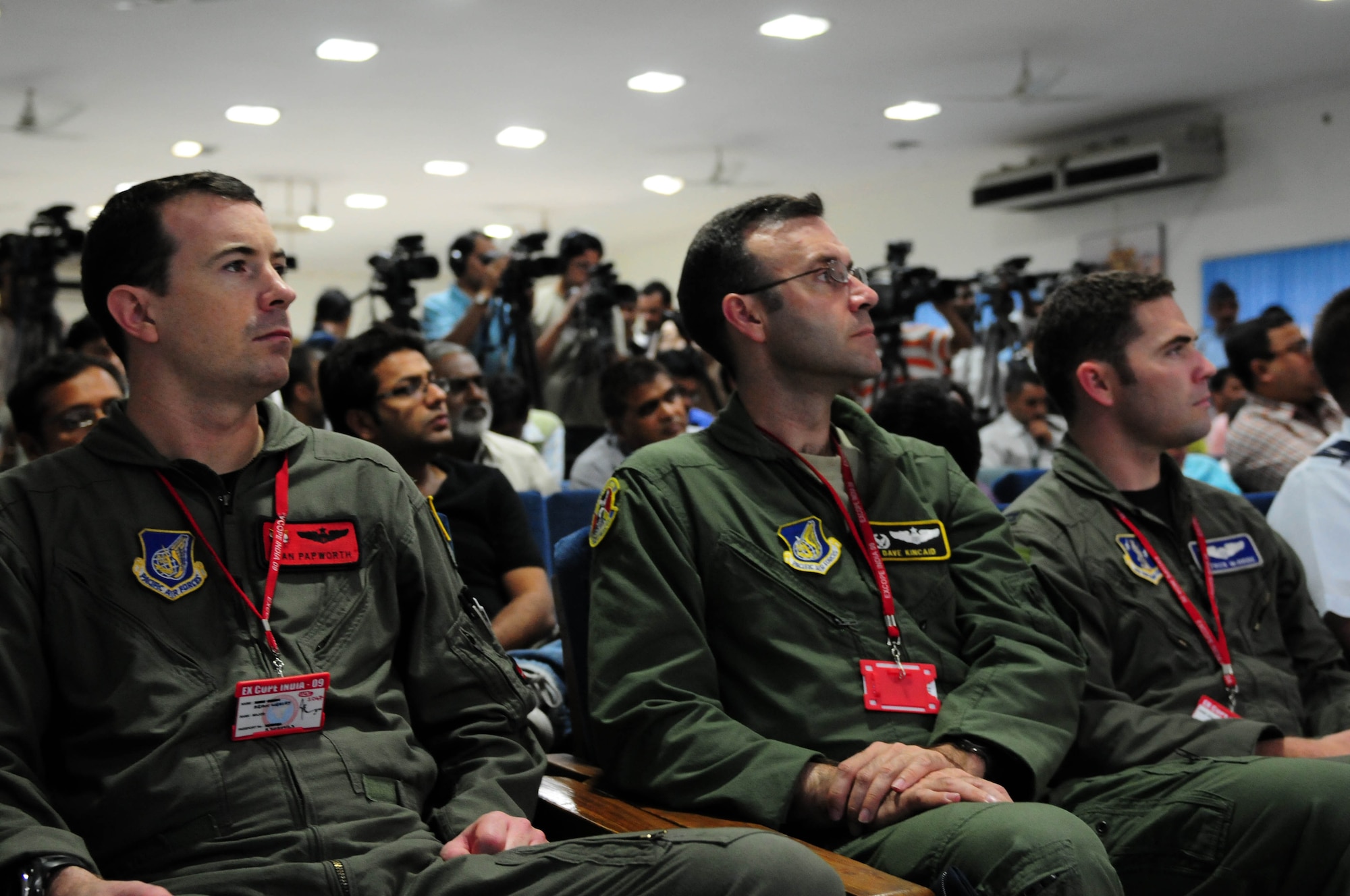 Maj. Sean Papworth (L), Lt. Col. Dave Kincaid and Capt. Patrick McBride standby to give aircraft related expertise during a Cope India press conference at Air Force Station Agra, India, where nearly 85 Indian media representatives were in attendance. More than 150 U.S. Air Force and Army personnel are participating in Cope India, a United States and India airlift exercise that provides training for humanitarian assistance and disaster relief operations. Maj. Papworth is from the 535th Airlift Squadron at Hickam Air Force Base, Hawaii; Colonel Kincaid is from the 36th AS at Yokota Air Base, Japan; Captain McBride is from the 115th Airlift Squadron at Channel Islands Air National Guard Station, Port Hueneme, Calif. (U.S. Air Force photo/ Capt. Genieve David) 