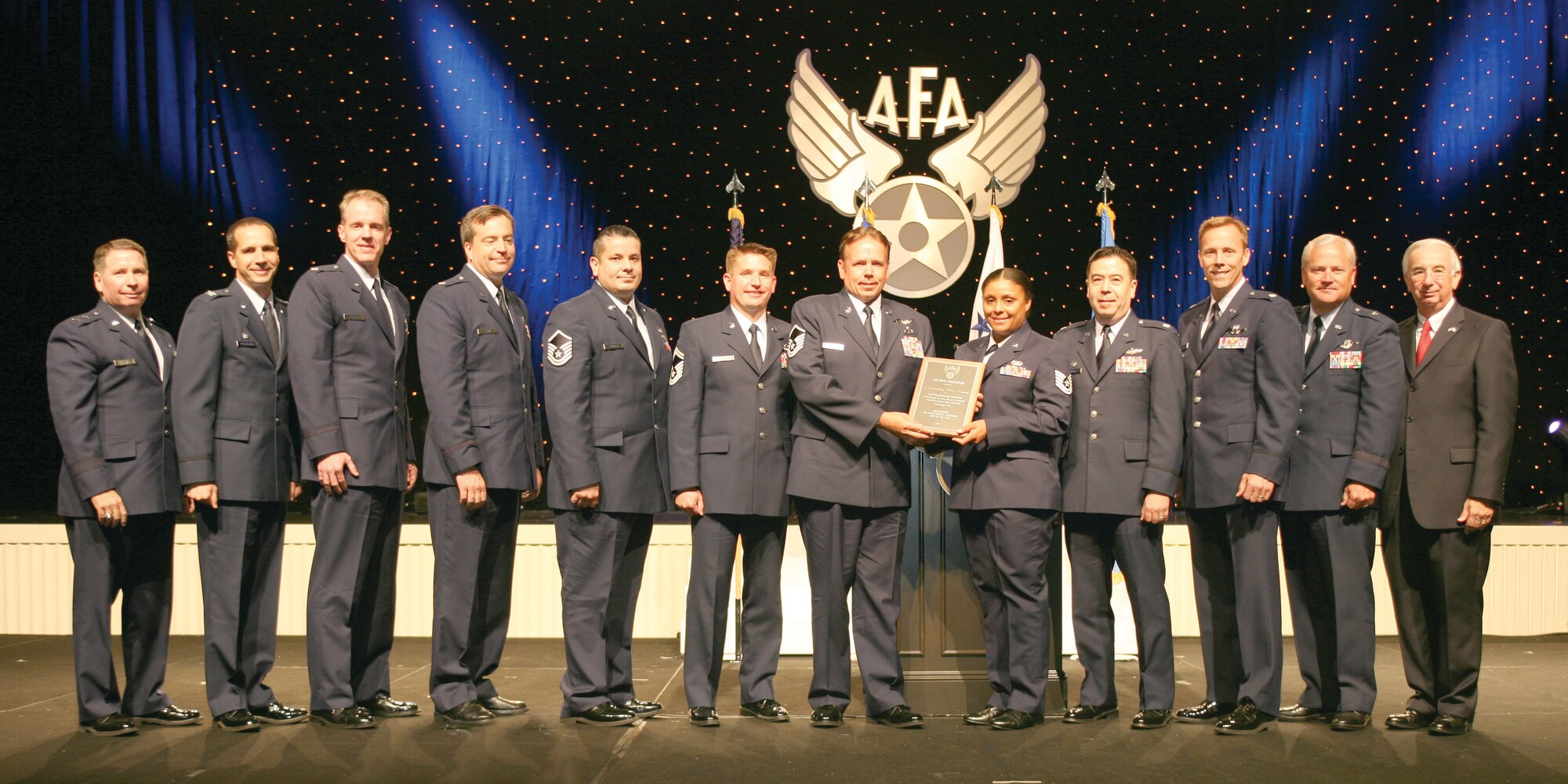 452nd Air Mobility Wing Commander Brig. Gen. James L. Melin (second from right) and representatives from the 336th Air Refueling Squadron accept the Air Force Association (AFA) Air Force Reserve Unit Award Sept. 16 at the AFA’s 2009 Air and Space Conference and Technology Exhibition in National Harbor, Md. The award is given to the Air Force Reserve unit which displays superior performance and outstanding achievements. (Photo courtesy of the Air Force Association)

