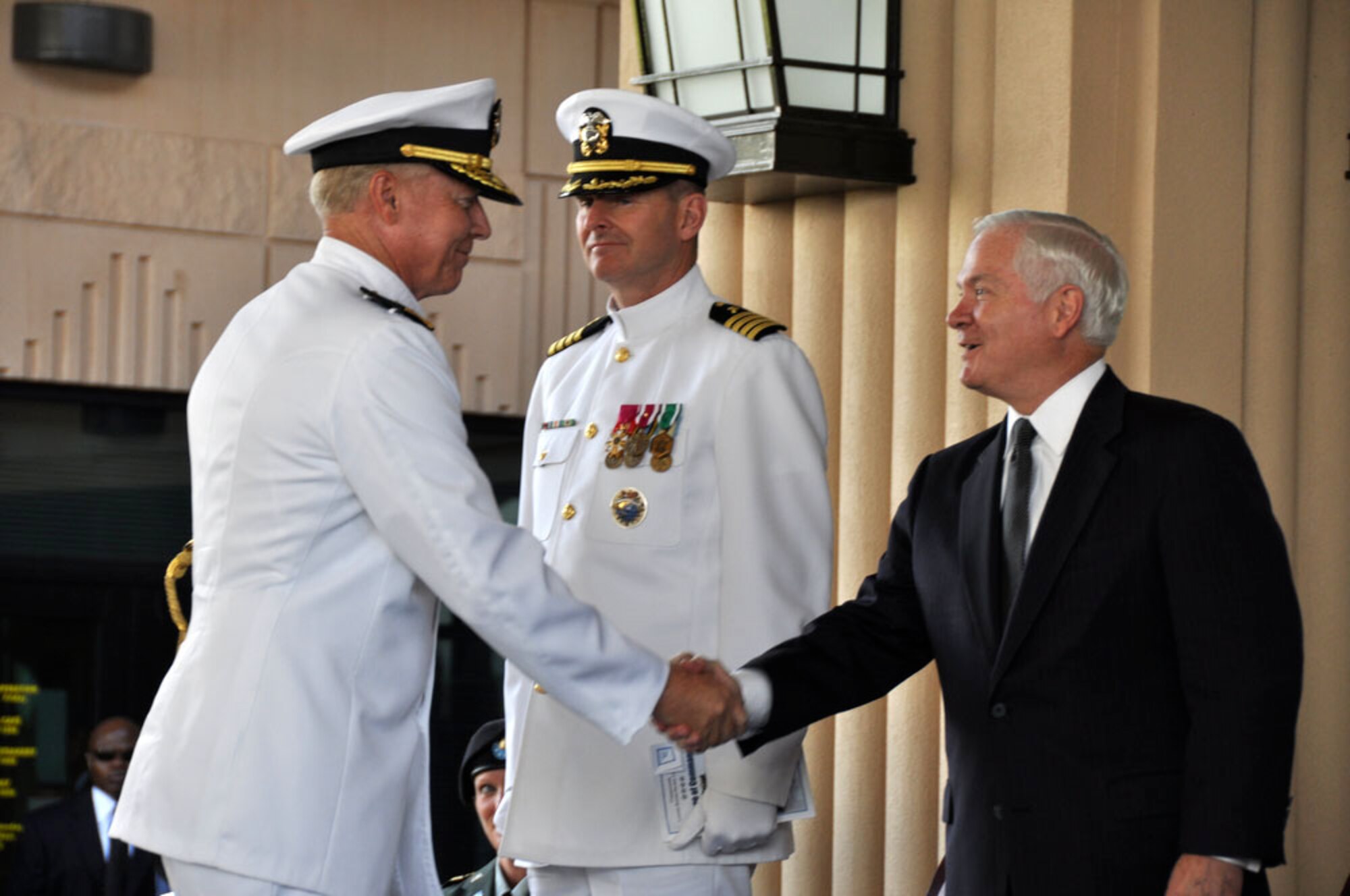 CAMP SMITH, Hawaii -- Navy Adm. Robert F. Willard shakes hands with Defense Secretary Robert Gates after assuming command of the U.S. Pacific Command at a change of command ceremony here. (U.S. Air Force photo/Tech Sgt. Cohen A. Young)