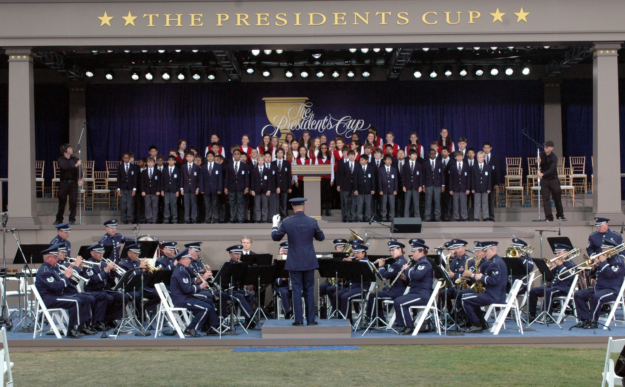 The United States Air Force Band of the Golden West performed for the Professional Golfers Association Presidents Cup Tournament opening ceremony Oct. 7 at Harding Park in San Francisco. More than 4,000 audience participants and 1.2 million television viewers watched the Band of the Golden West play festive ceremonial music before opening remarks were made. 

The Band of the Golden West was asked to perform at the Presidents Cup, through coordination with Richard Kaufman, PGA music director. Under the direction of Major Keith Bland, commander, Band of the Golden West, the band performed nine musical selections including the Star Spangled Banner for the crowd. “It was an honor to represent the Armed Forces and the Air Force,” said Major Bland. “We’re proud to serve as ambassadors of all the men and women in uniform.” Cheers from the crowd reiterated the love of music for the band members.

 Staff Sergeant Jill Corbett, tuba player, Band of the Golden West, expressed her appreciation for the warm crowd reception. “It rejuvenates my love for the job,” she said. “We received excellent exposure, and it was great for our unit and the entire Air Force.”Many prominent guests attended the opening ceremony including President George H.W. Bush Sr., Major League Baseball player Barry Bonds and San Francisco opera singer Zheng Cao. Members of the U.S. team included Phil Mickelson and Tiger Woods.

The Band of the Golden West is the only active-duty band west of the Rocky Mountains and contains multiple elements including a concert band, caroling band for the holidays, brass and woodwind quintets and a rock band. An ensemble of the large concert band performed at the tournament, playing upbeat marches and fanfares for the audience. Comprised of 45 to 49 members, the band supports 10 Air Force bases in the western states including Nevada, Oregon, Idaho and Washington. They perform an average of 200 performances a year. “We represent excellence that exists throughout the Air 