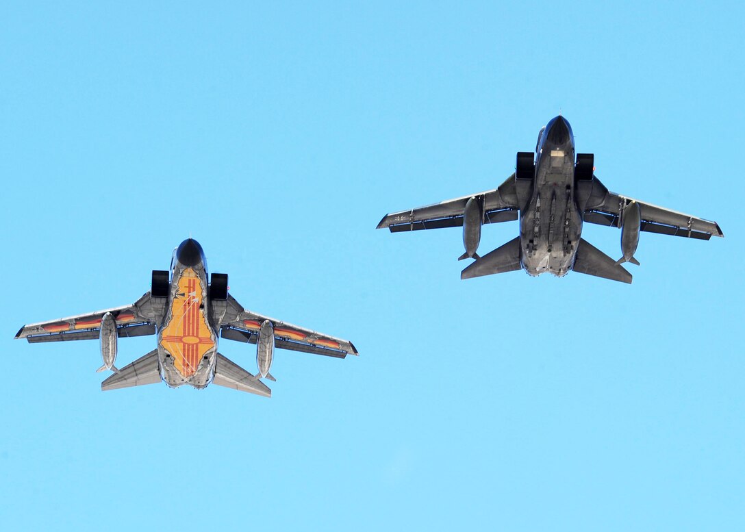 Two German Tornados, one specially painted to commemorate the event, fly over the German air force Flying Training Center at Holloman Air Force Base, N.M. Oct. 13, 2009, on the way to achieving the 55,555th flight hourin a Tornado.  Col. Peter Klement, German air force Flying Training Center commander and Col. Jeff Harrigian, 49th Fighter Wing commander, were flying the painted Tornado.  (U.S. Air Force photo by Airman 1st Class Veronica Stamps)