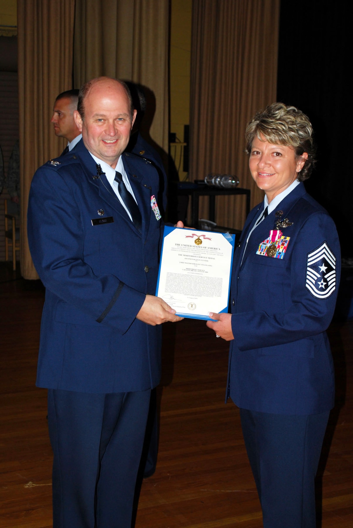 Chief Master Sergeant Tina M. Long, an Air Force Reservist with the 507th Air Refueling Wing, recently received the Air Force Meritorious Service Medal. 

Chief Long, who serves as the 507th ARW Command Chief, distinguished herself for her integral efforts to develop sustaining relationships with Team Tinker active duty organizations and 931st McConnell Chief Groups, located at McConnell AFB, Kansas, as well as her efforts to help stand up the first-of-its kind Air Force Reserve Command and Air National Guard Associate wing through her efforts to integrate senior enlisted leadership. 

She also was a key leadership team member helping the wing prepare for a Security Forces 6-month deployment to Kirkuk Iraq. She was also pivotal in the Secretary of Defense-directed, "Yellow Ribbon" reintegration program ensuring effective redeployment constructs for over 300 battle-worn Airmen.