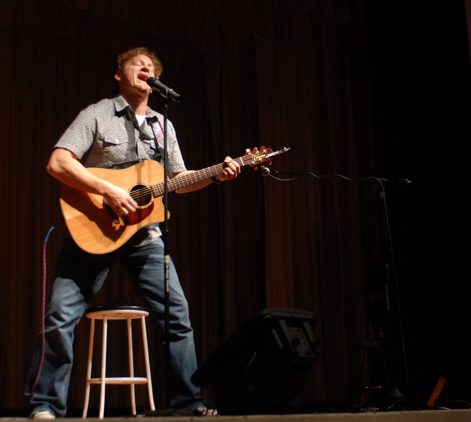 Tim Hawkins, standup comedian, performes in support of the military and their families at the Luke Air Force Base Theatre on October 15, 2009. The Luke Air Force Base Chapel and Club Communities held the event with hosts Tim & Willy from KMLE country music station. (U.S. Air Force photo by Airman 1st Class Sandra Welch)  