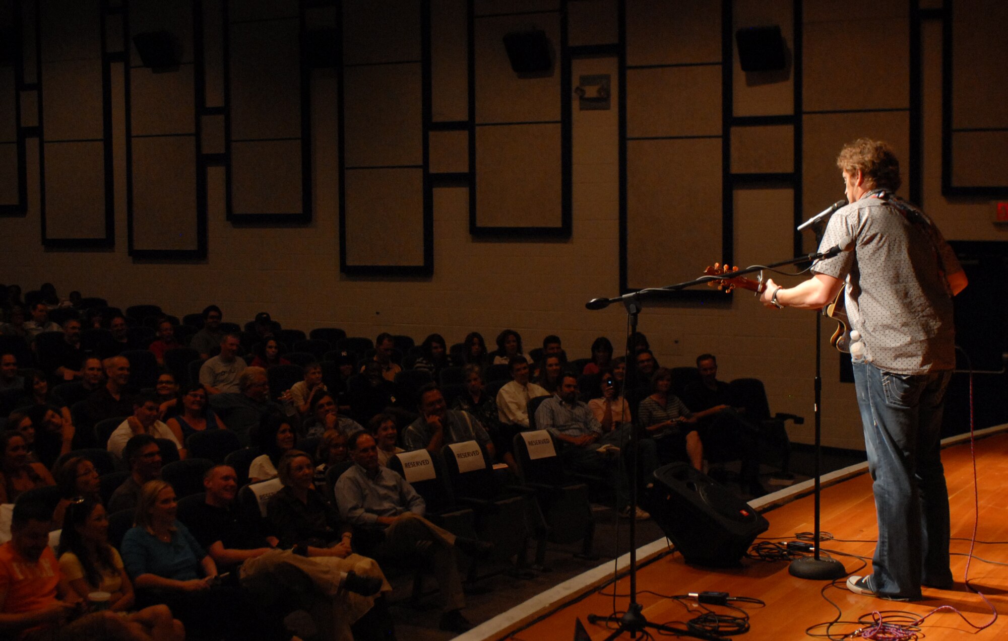Tim Hawkins, standup comedian, performes in support of the military and their families at the Luke Air Force Base Theatre on October 15, 2009. The Luke Air Force Base Chapel and Club Communities held the event with hosts Tim & Willy from KMLE country music station. (U.S. Air Force photo by Airman 1st Class Sandra Welch)  
