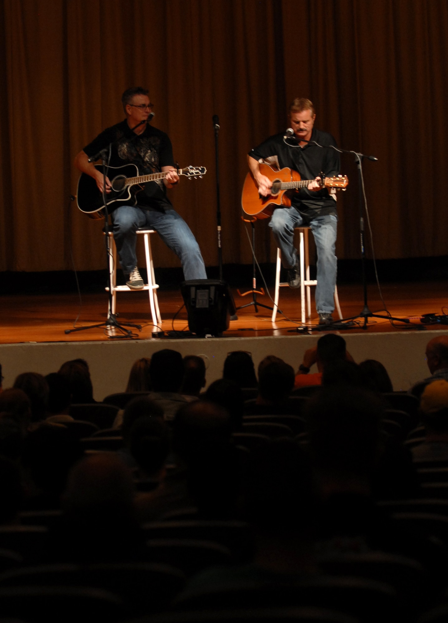 Tim & Willy from KMLE country music station, hosted and shared a couple of songs before Tim Hawkins' comedy performance at the Luke Air Force Base Theatre, October 15, 2009. The Luke Air Force Base Chapel and Club Communities held the event with hosts Tim & Willy from KMLE country music station. (U.S. Air Force photo by Airman 1st Class Sandra Welch)  