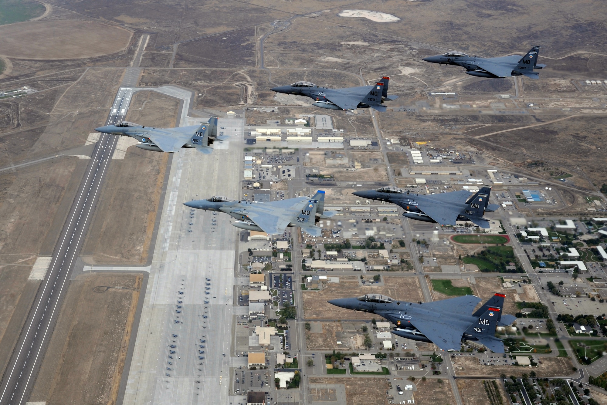 OVER IDAHO -- A six-ship formation of F-15C Eagle and F-15E Strike Eagles fly over Mountain Home Air Force Base Oct. 13. (U.S. Air Force photo by Master Sgt. Kevin J. Gruenwald)