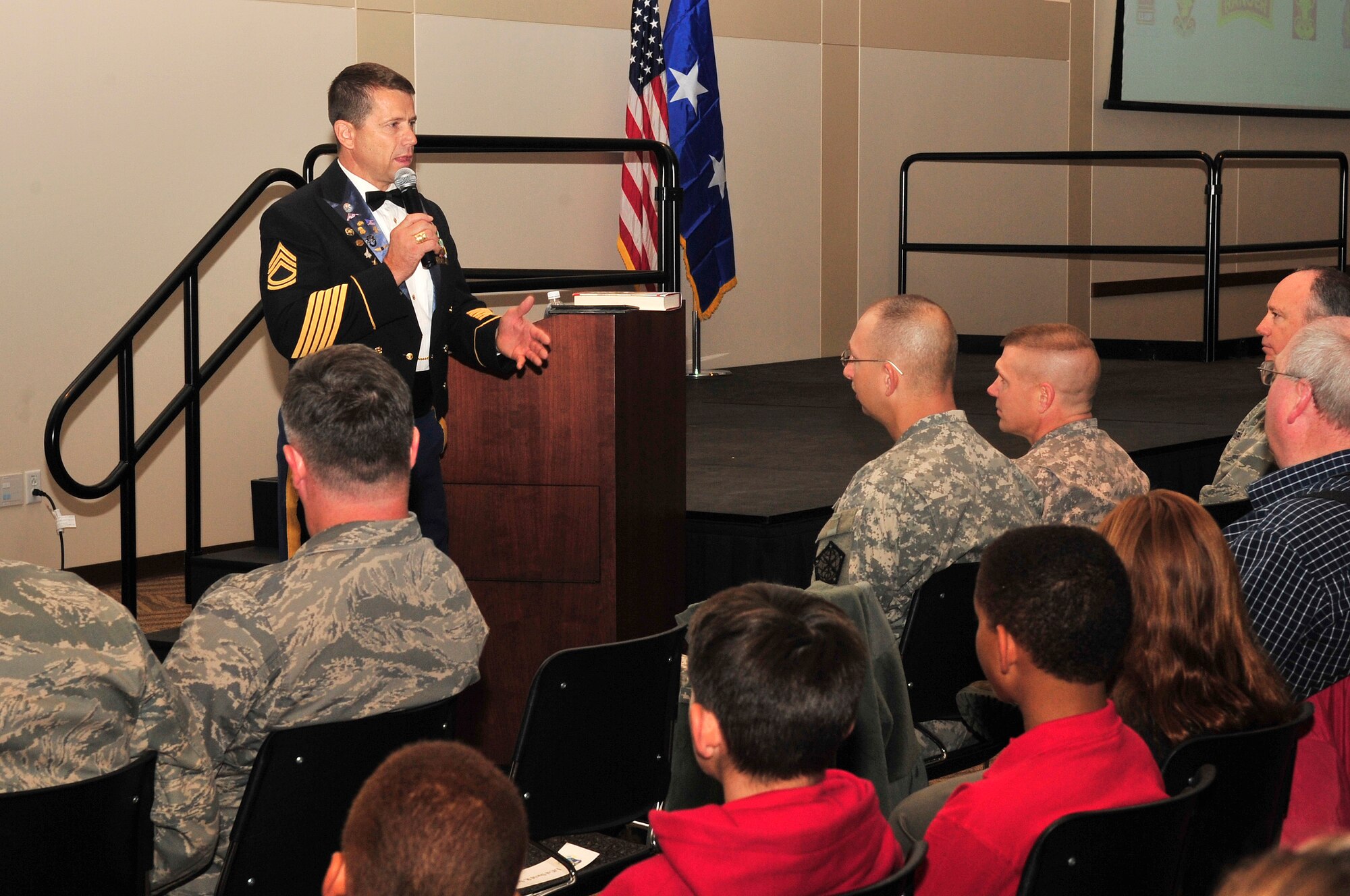 Retired Sgt. 1st Class Dana Bowman speaks to members of Team Buckley at the Leadership Development Center, Oct. 16. Sergeant Bowman explains the contributions made by the disabled employees in the work force.  (U.S. Air Force photo by Airman 1st Class Manisha Vasquez)