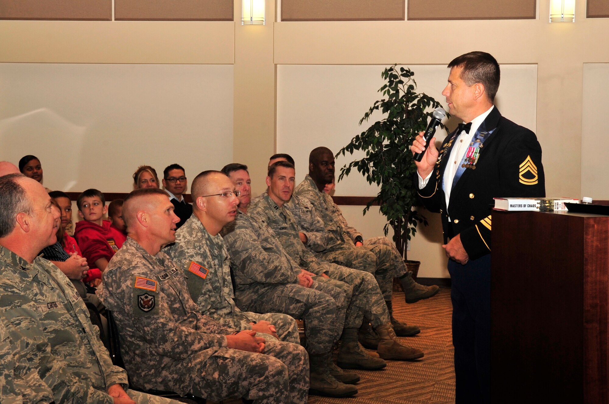Retired Sgt. 1st Class Dana Bowman speaks to members of Team Buckley at the Leadership Development Center, Oct. 16. Sergeant Bowman tells his story of being the first double amputee to re-enlist into the U.S. Army. (U.S. Air Force photo by Airman 1st Class Manisha Vasquez)