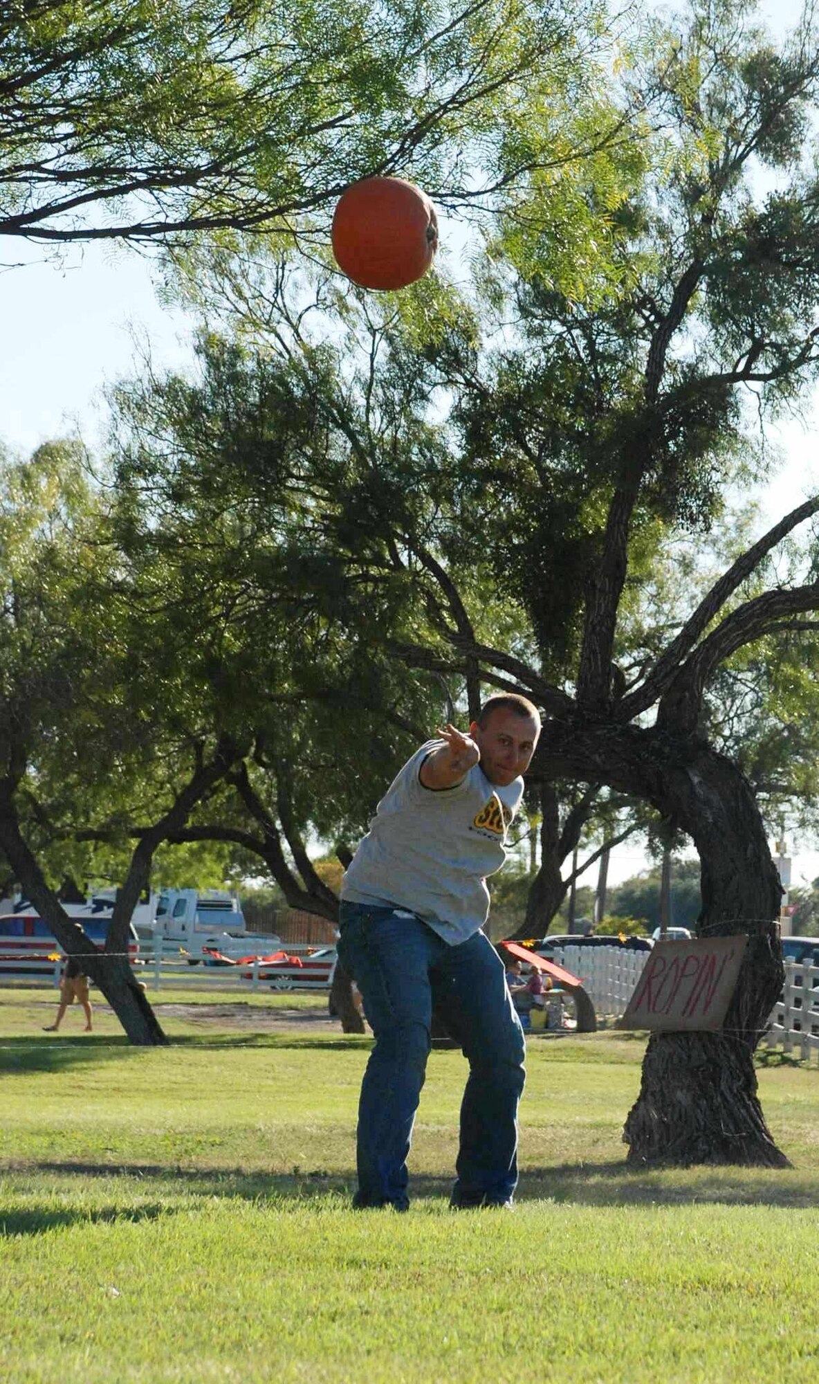 LAUGHLIN AIR FORCE BASE, Texas – Second Lt. Gary Meyer, 47th Operations Support Squadron, participates in the pumpkin-toss event at the annual fall festival here Oct. 17. The festival was hosted by the Laughlin Officers’ Spouses’ Club, which uses the money raised to assist in causes that benefit the Laughlin and Del Rio communities in a number of ways, including providing scholarships for local high school seniors and military spouses. (U.S. Air Force photo by Airman 1st Class Blake Mize)
