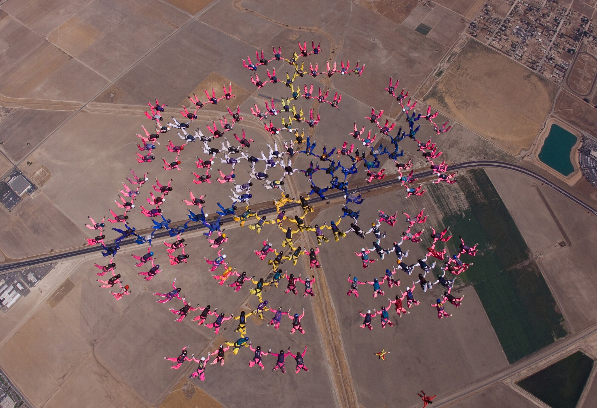 Setting a new world record for an all-female skydive formation, 181 women from 31 countries freefall over Perris Skydive, Perris, Calif., Sept. 27, on the final day of the week-long Jump for the Cause 2009.  The event was to raise money and awareness for breast cancer research.  (Courtesy photo/Jump for the Cause team photographer)