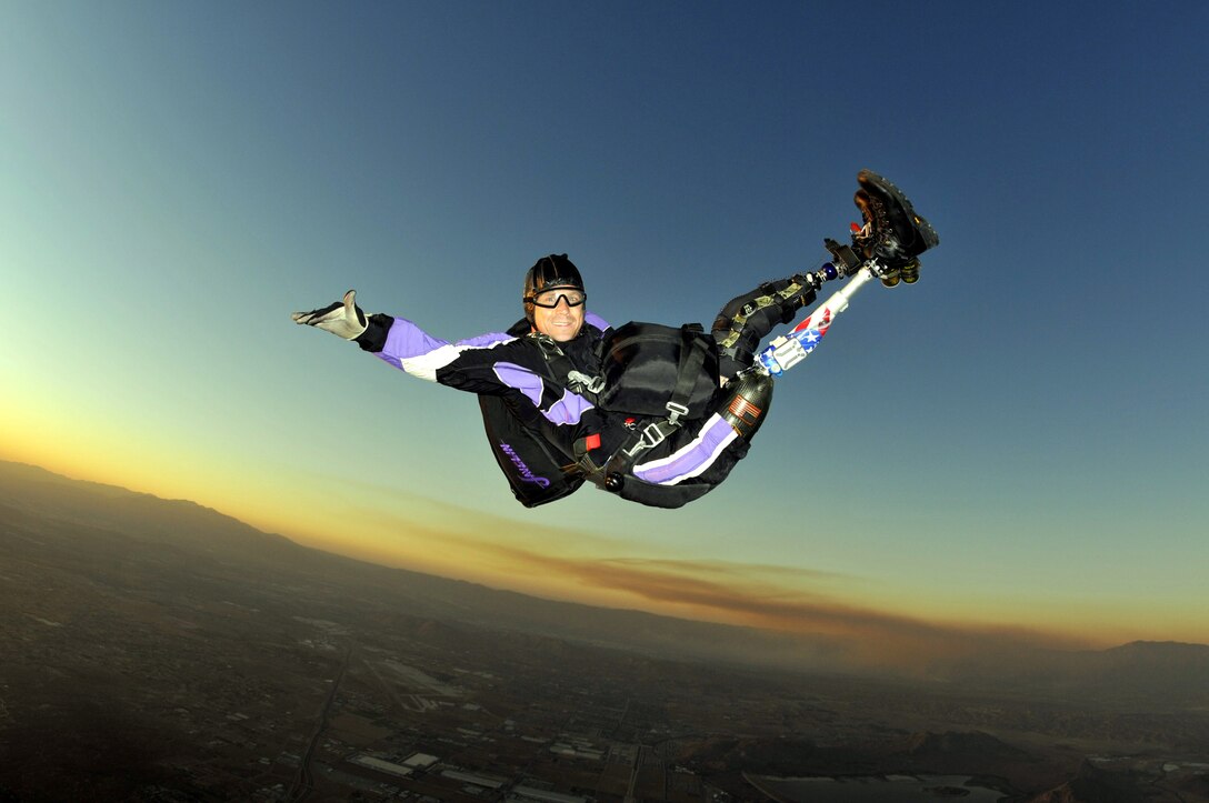 Dana Bowman, former Special Forces soldier and member of the U.S. Army's elite parachute team, The Golden Knights, skydives over Perris Skydive, Perris, Calif., as part of Wounded Warrior Day at Jump for the Cause 2009. Although a 1994 mid-air collision cost him both of his legs, his determination in the Army, and now in the civilian world, has earned him worldwide recognition as a motivational speaker and skydive demonstrator.  (Courtesy photo/Henny Wiggers, Jump for the Cause team photographer)  