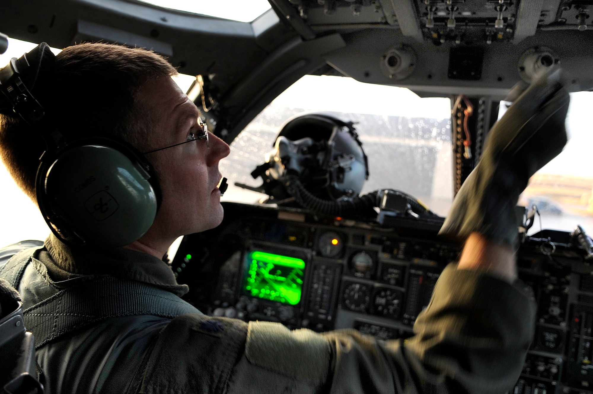 ELLSWORTH AIR FORCE BASE, S.D.--Lt. Col. Jason Combs, 28th Bomb Wing director of staff, works his way through pre-flight checklists from the cockpit of a B-1B Lancer, Oct. 15. The pilot performs pre-flight checks to ensure all systems are functioning before every mission. (U.S. Air Force photo/Airman 1st Class Corey Hook)