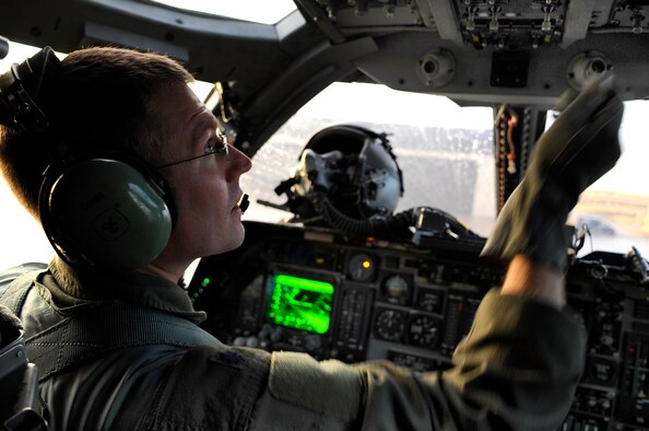 ELLSWORTH AIR FORCE BASE, S.D.--Lt. Col. Jason Combs, 28th Bomb Wing director of staff, works his way through pre-flight checklists from the cockpit of a B-1B Lancer, Oct. 15. The pilot performs pre-flight checks to ensure all systems are functioning before every mission. (U.S. Air Force photo/Airman 1st Class Corey Hook)