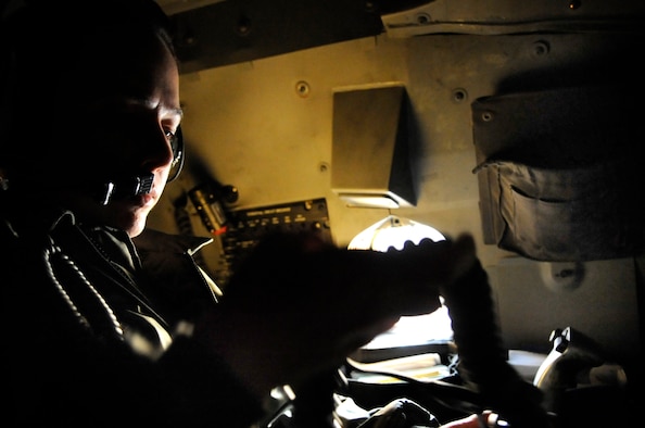 ELLSWORTH AIR FORCE BASE, S.D. -- Capt. Kaylene Giri, 34th Bomb Squadron B-1B Lancer weapons systems officer instructor, proceeds through a weapons system preflight checklist, Oct. 15. As a weapons systems officer, Captain Giri works with the pilots and other weapons systems officers to collectively achieve and maintain crew efficiency, situational awareness and mission effectiveness. (U.S. Air Force photo/Airman 1st Class Corey Hook)
