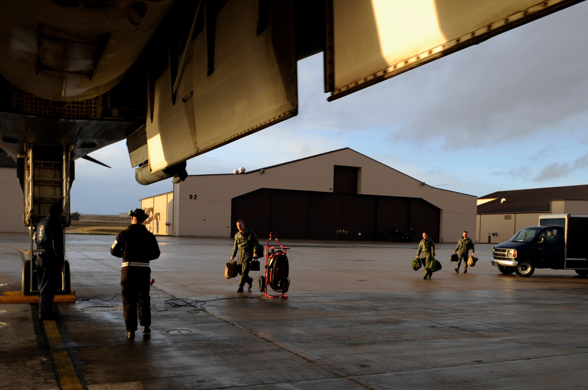 ELLSWORTH AIR FORCE BASE, S.D.--Ellsworth pilots and weapons system officers arrive at a B-1B Lancer for takeoff, Oct. 15. The aircraft is operated by a four man crew which includes the pilot, co-pilot, defensive systems operator and offensive systems operator. (U.S. Air Force photo/Airman 1st Class Corey Hook)
