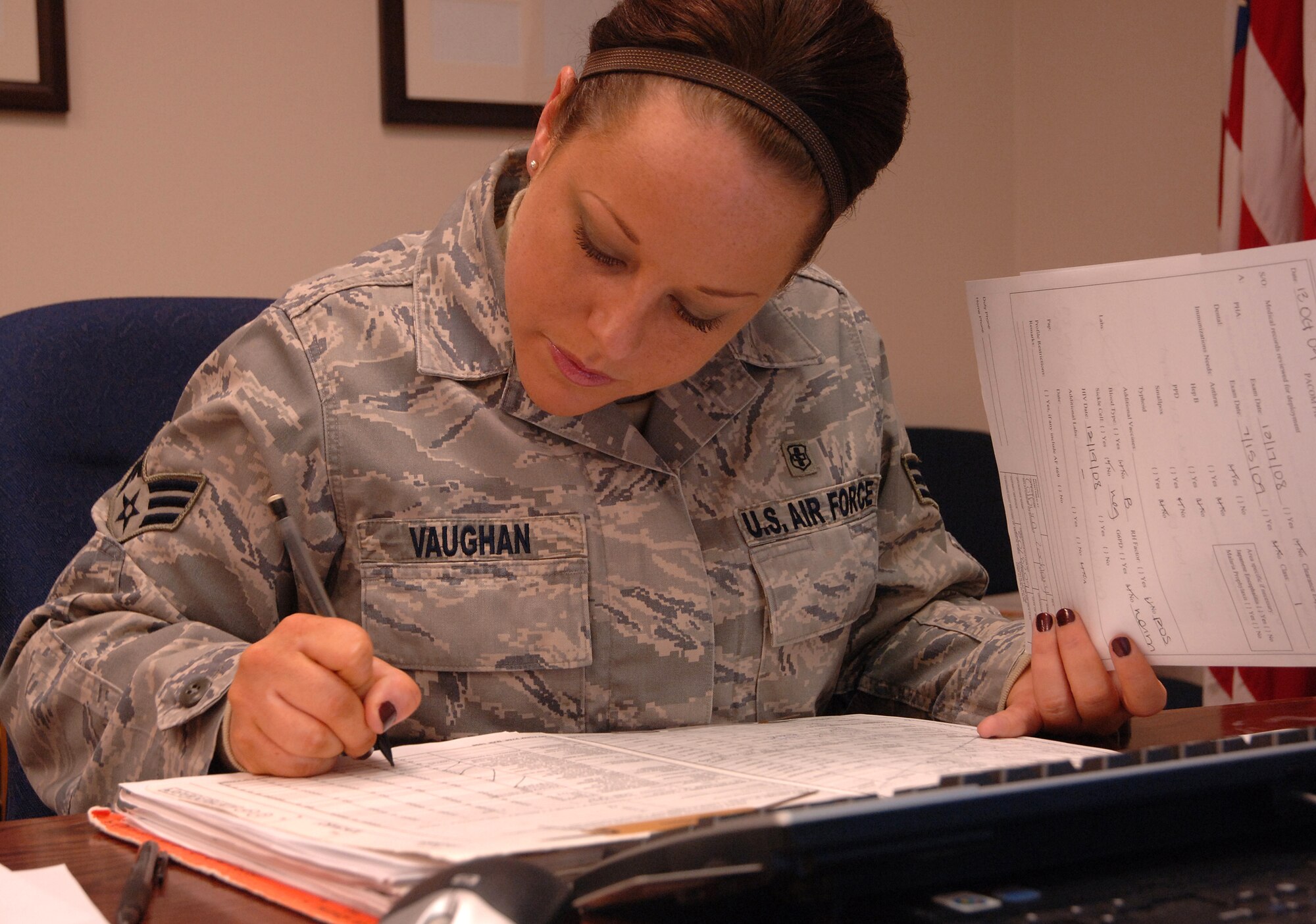 Senior Airman Jennifer E. Vaughan, 319th Medical Operation Squadron, reviews patient records in preparation for the wing’s upcoming Operational Readiness Inspection Oct. 20 at the Grand Forks Air Force Base Medical Treatment Facility. Airman Vaughan and her team have reviewed more than 594 records to date and are ensuring maximum medical readiness by clearing as many patients as possible for deployment. (U.S. Air Force photo by Senior Airman R. Michael Longoria)