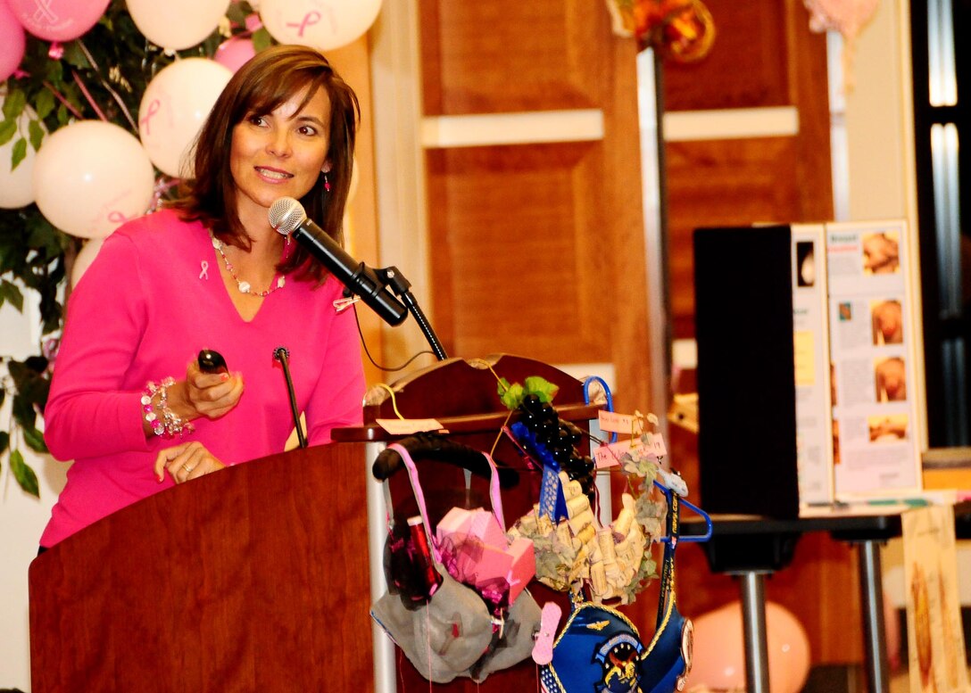 ANDERSEN AIR FORCE BASE, Guam - Lina Ruhlman, wife of the 36th Wing Commander Brig. Gen. Phil Ruhlman, shares her personal story of surviving breast cancer during a Breast Cancer Awareness Open House at the 36th Medical Group clinic Oct. 20. Mrs. Ruhlman said despite living a healthy lifestyle, she was diagnosed with breast cancer more than three years ago.  She attributed early detection and annual exams as key factors in her recovery.  (U.S. Air Force photo by Senior Airman Nichelle Anderson)