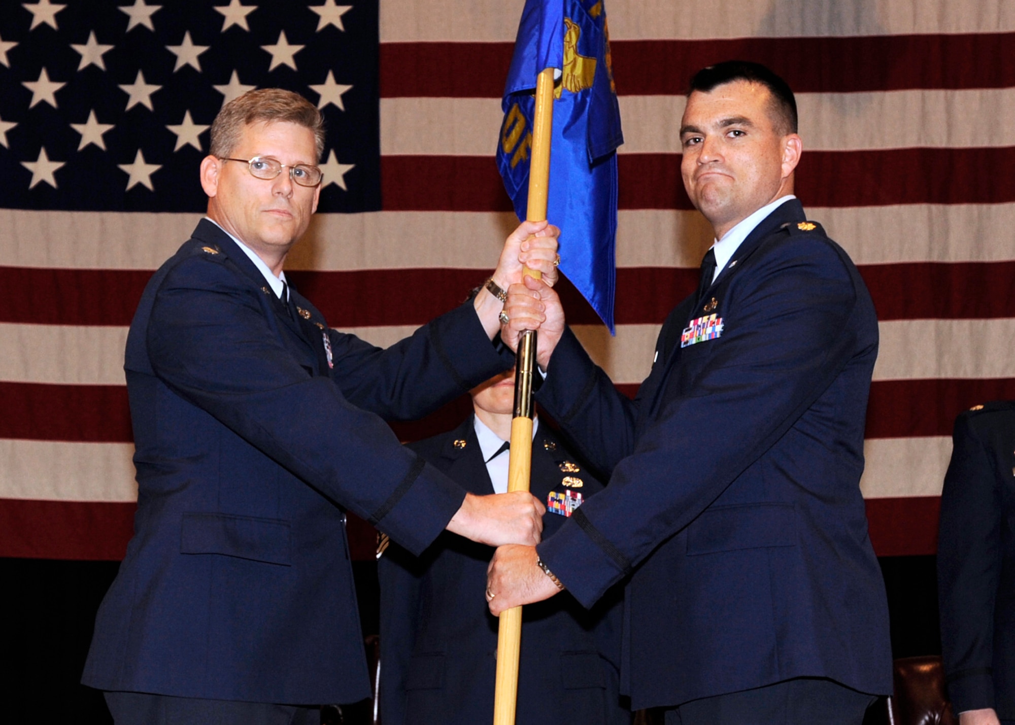 Maj. Bradley Garcia (on right) assumed command of the 931st Maintenance Operations Flight during a ceremony at McConnell Air Force Base, Kan., on Oct. 18. Lt. Col. Jeff Pickard (on left) is the 931st deputy commander for maintenance. (U.S. Air Force photo/Staff Sgt. Jaime Train)