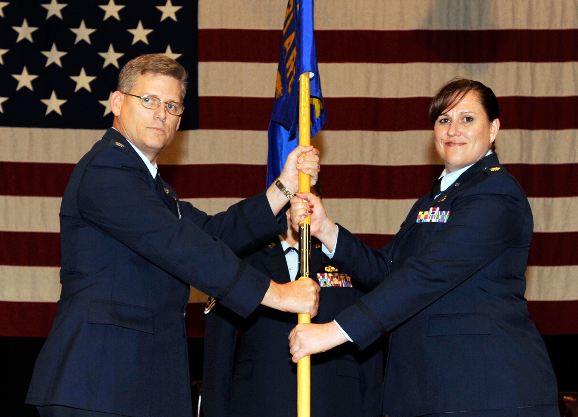 Lt. Col. Sherry Teague assumed command of the 931st Maintenance Squadron during a ceremony at McConnell Air Force Base, Kan., on Oct. 18. Lt. Col. Jeff Pickard (on left) is the 931st deputy commander for maintenance. (U.S. Air Force photo/Staff Sgt. Jaime Train)