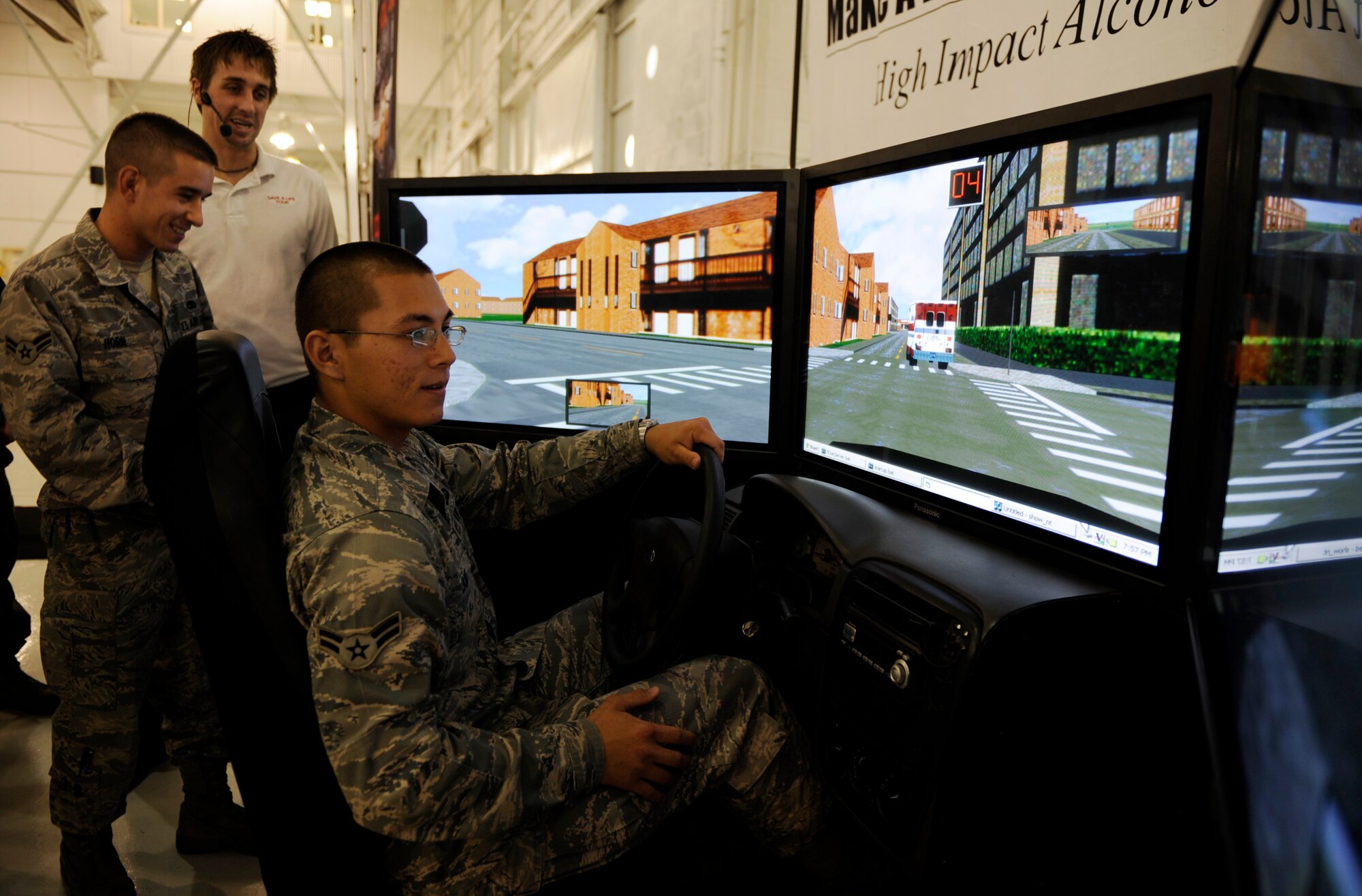 MOUNTAIN HOME AIR FORCE BASE, Idaho -- Airman 1st Class John Laney, 366th Civil Engineer Squadron electrical environmental apprentice, sits in a drunk-driving simulator during the Save a Life Tour Oct. 19. The Save a Life Tour is an alcohol-awareness program designed to educate people about the dangers associated with drinking and driving. The presentation started with a 15 minute video showing real life tragedies. Gunfighters then got a chance to sit in a drunk-driving simulator, which attempts to replicate the sensation of being intoxicated behind the wheel. (U.S. Air Force photo by Airman 1st Class Renishia Richardson)
