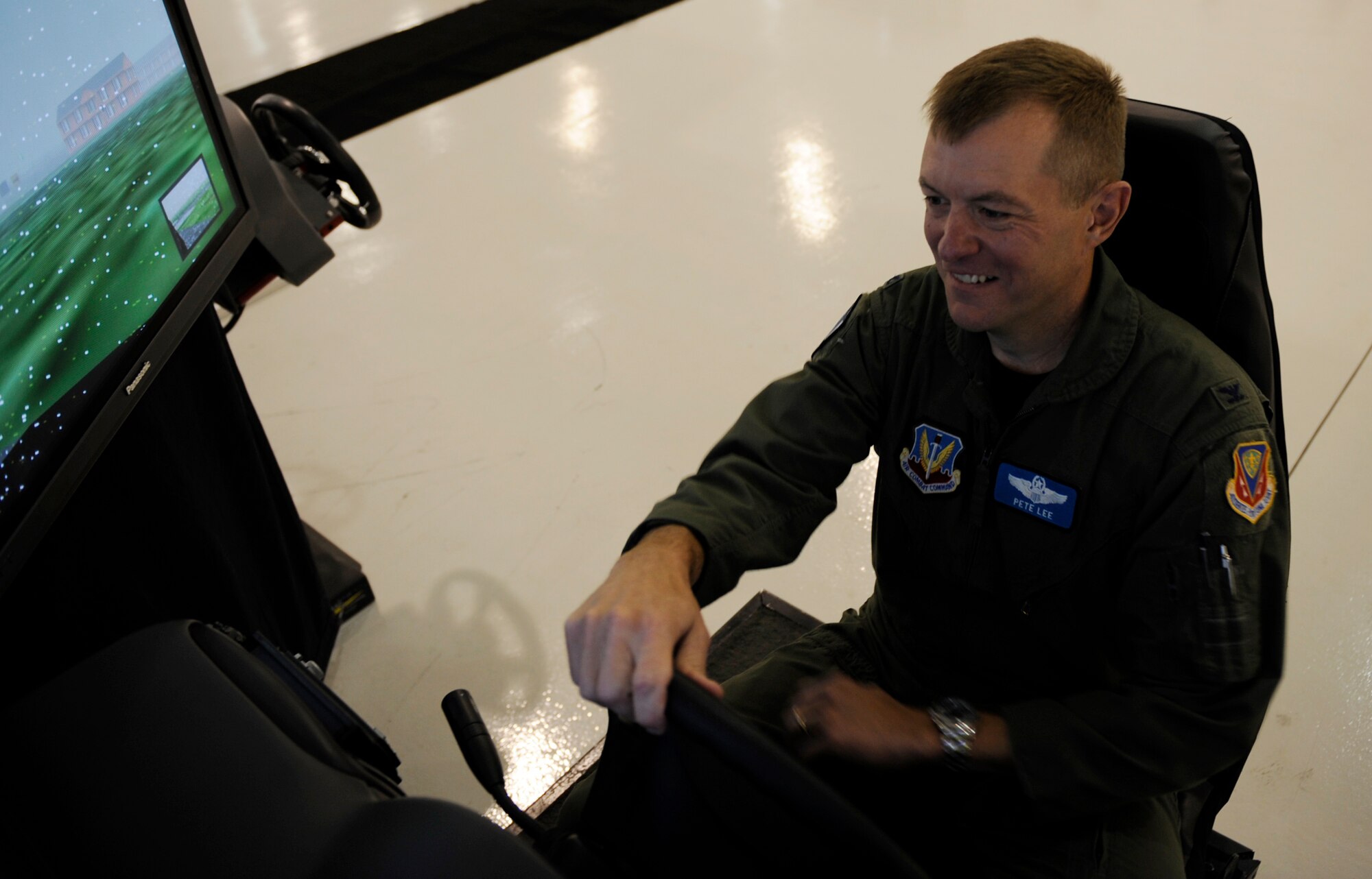 MOUNTAIN HOME AIR FORCE BASE, Idaho-- Col. Peter Lee, 366th Fighter Wing vice commander, sits in a drunk-driving simulator during the Save a Life Tour Oct. 19. The Save a Life Tour is an alcohol-awareness program designed to educate people about the dangers associated with drinking and driving. The presentation started with a 15 minute video showing real life tragedies. Gunfighters then got a chance to sit in a drunk-driving simulator, which attempts to replicate the sensation of being intoxicated behind the wheel. (U.S. Air Force photo by Airman 1st Class Renishia Richardson)